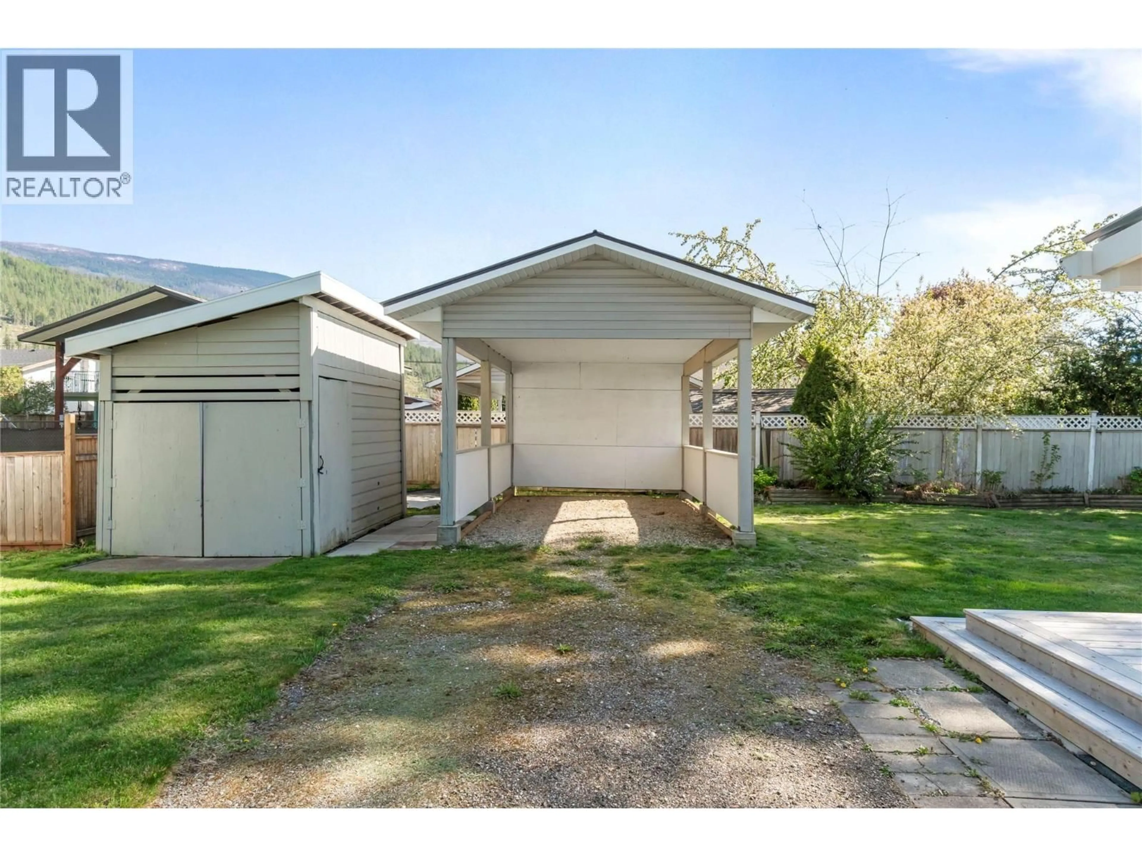 A pic from outside/outdoor area/front of a property/back of a property/a pic from drone, street for 725 CONN STREET, Sicamous British Columbia V0E2V0
