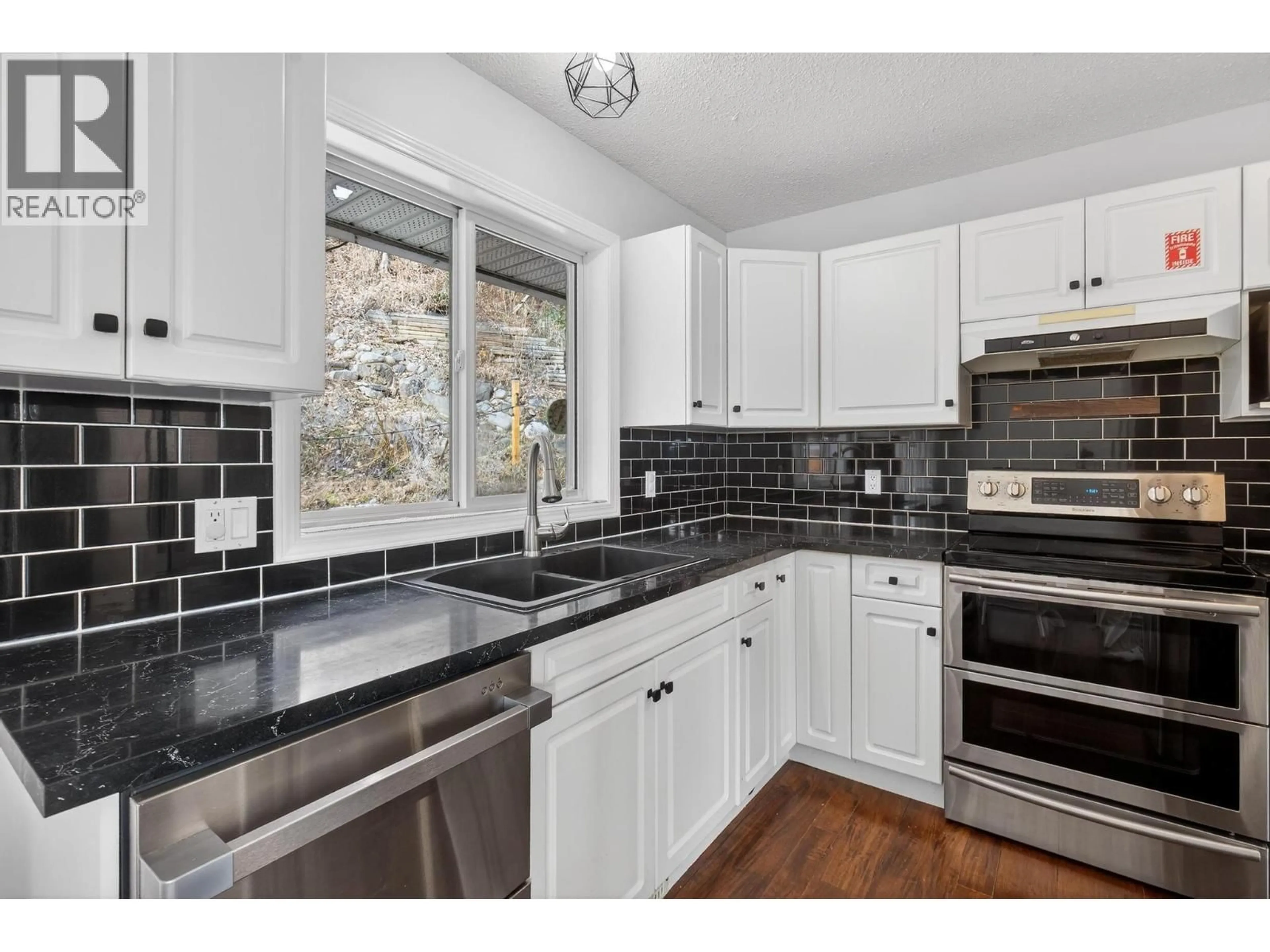 Open concept kitchen, ceramic/tile floor for 3220 MCIVER ROAD, West Kelowna British Columbia V4T1G1