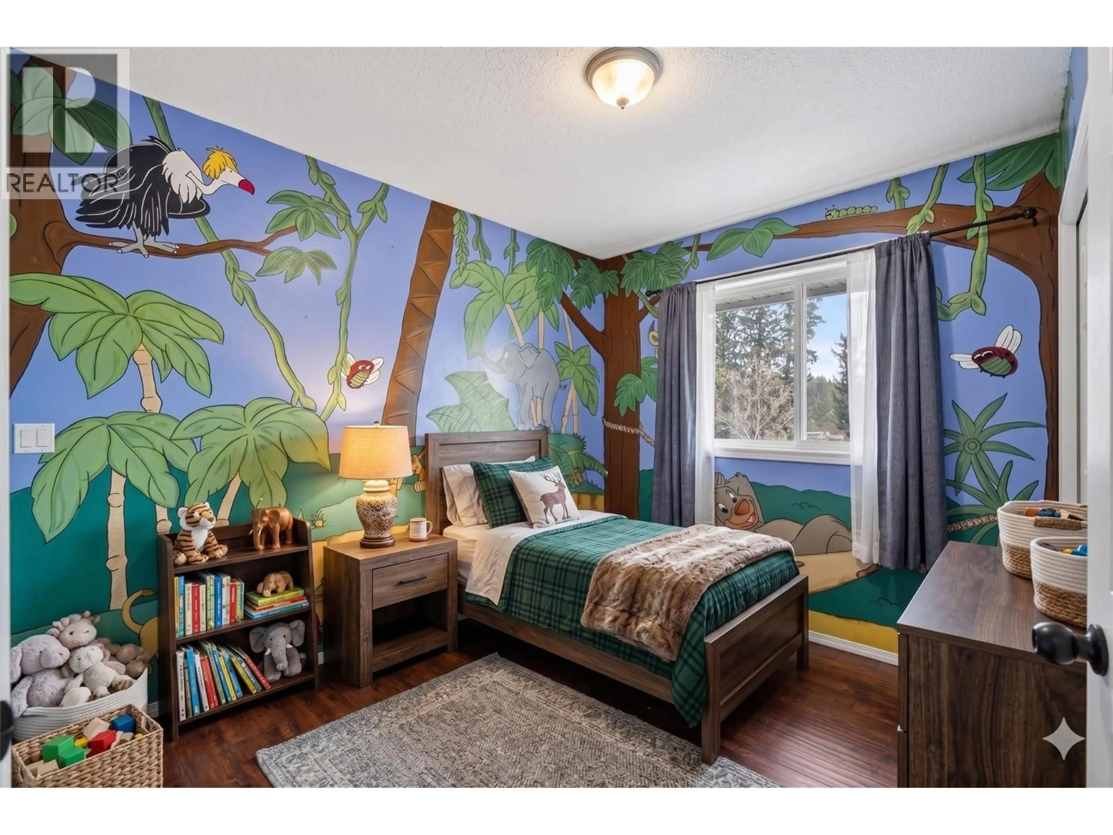 Bedroom with bed, wood/laminate floor for 3220 MCIVER ROAD, West Kelowna British Columbia V4T1G1