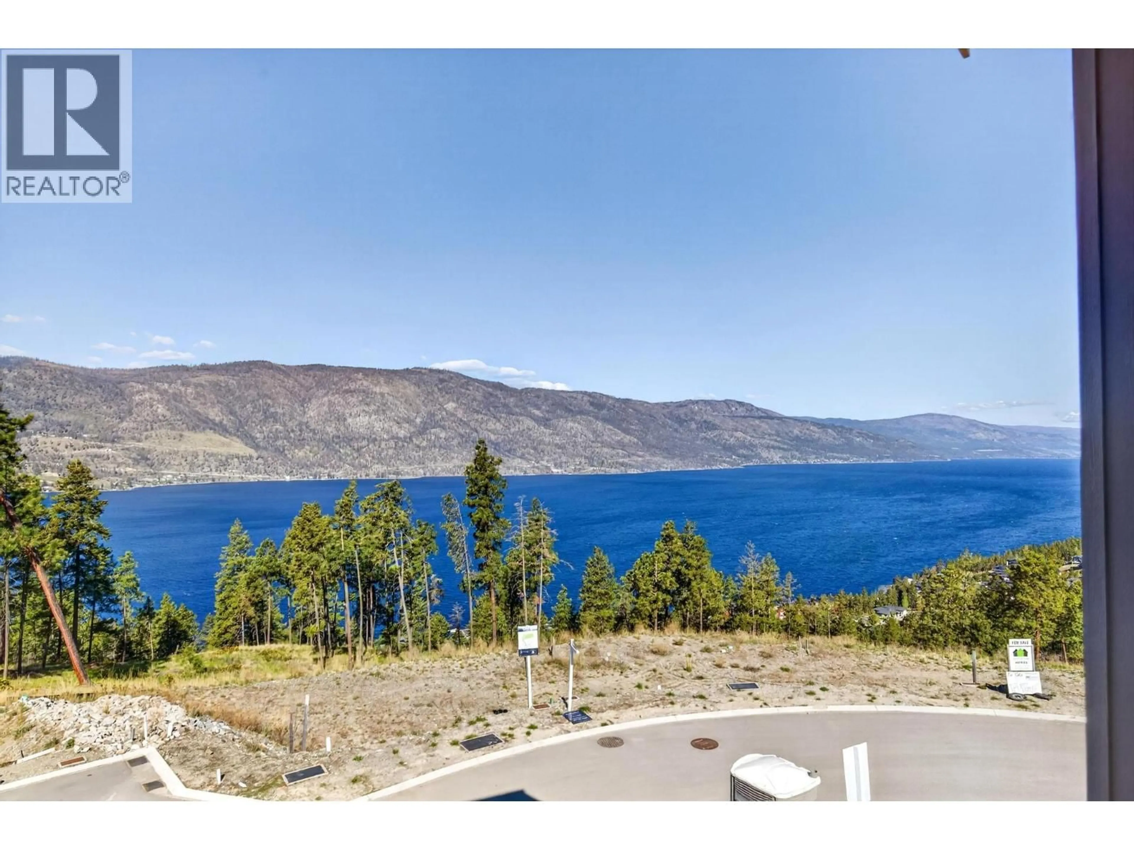A pic from outside/outdoor area/front of a property/back of a property/a pic from drone, water/lake/river/ocean view for 3276 ASPEN LANE, Kelowna British Columbia V1V0G8