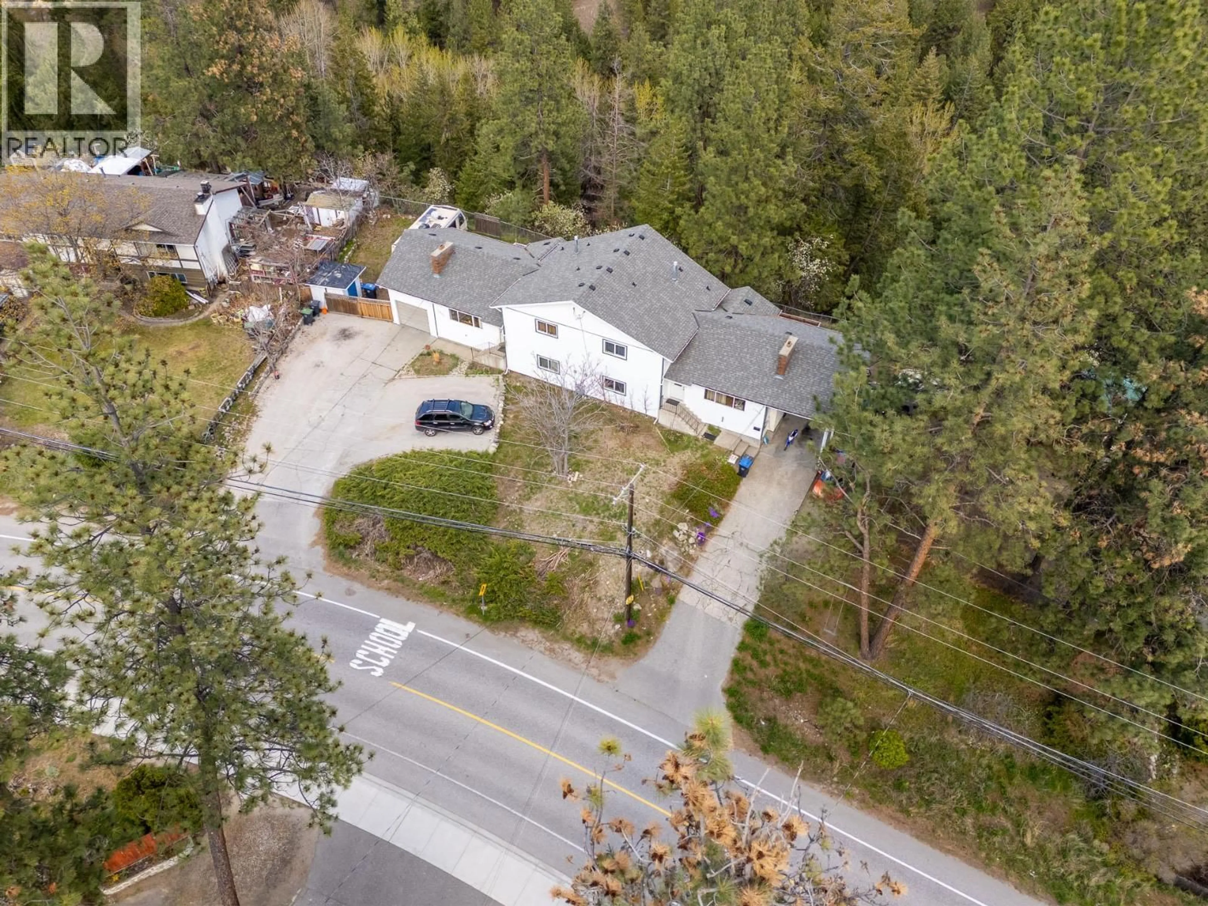 A pic from outside/outdoor area/front of a property/back of a property/a pic from drone, street for 3395/3397 WEBBER ROAD, West Kelowna British Columbia V4T1H2