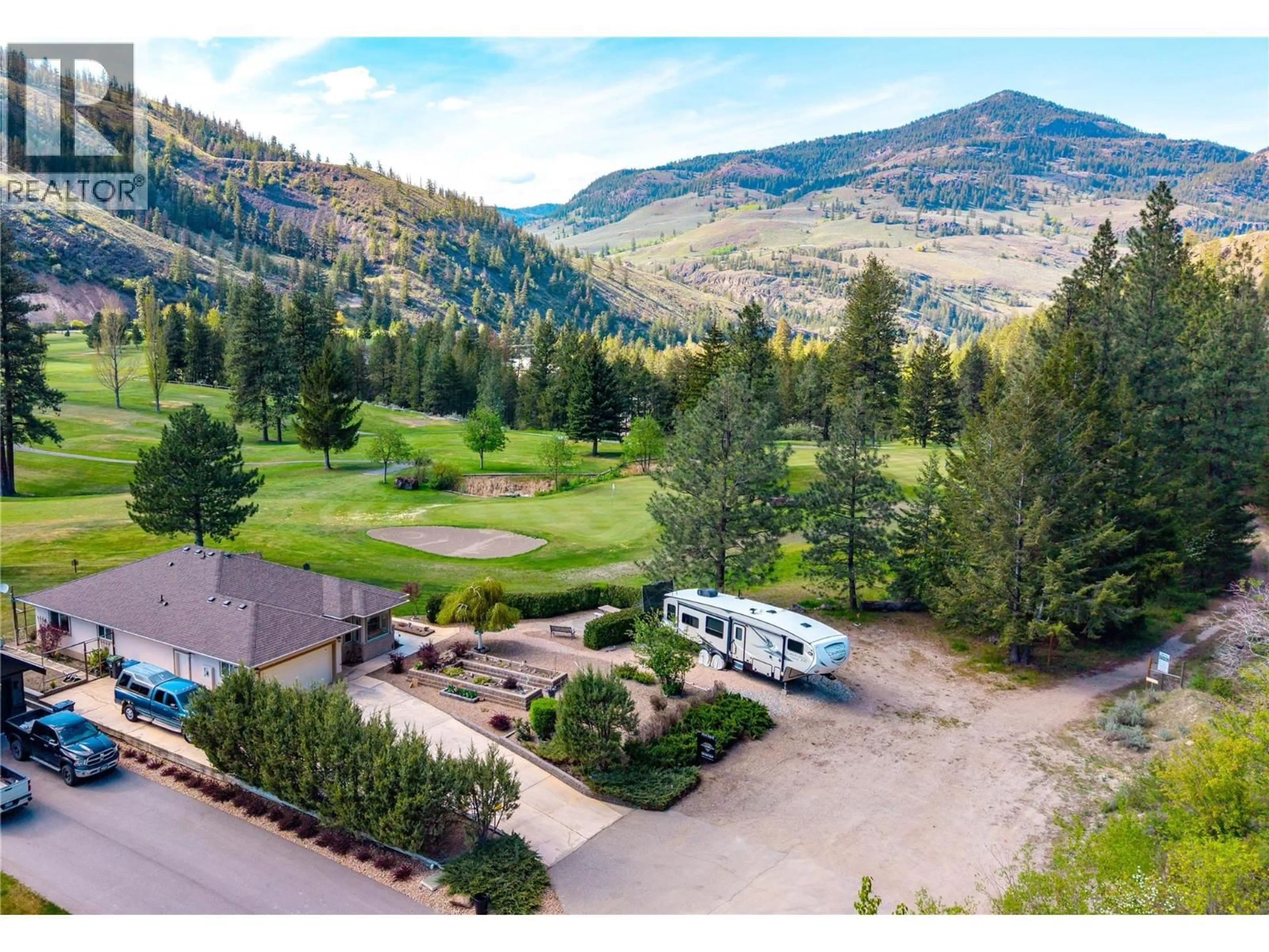 A pic from outside/outdoor area/front of a property/back of a property/a pic from drone, mountain view for 202 RANGE ROAD, Kaleden British Columbia V0H1K0