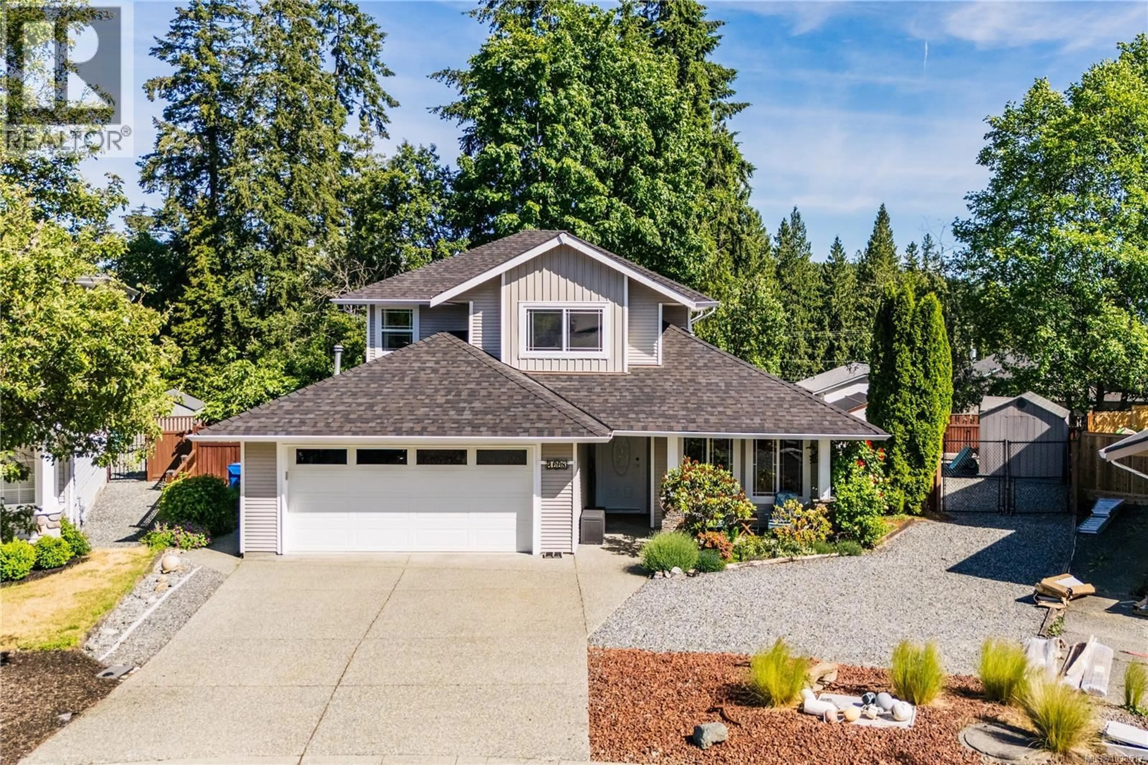Home with vinyl exterior material, street for 1668 WHITE BLOSSOM WAY, Nanaimo British Columbia V9X1X4