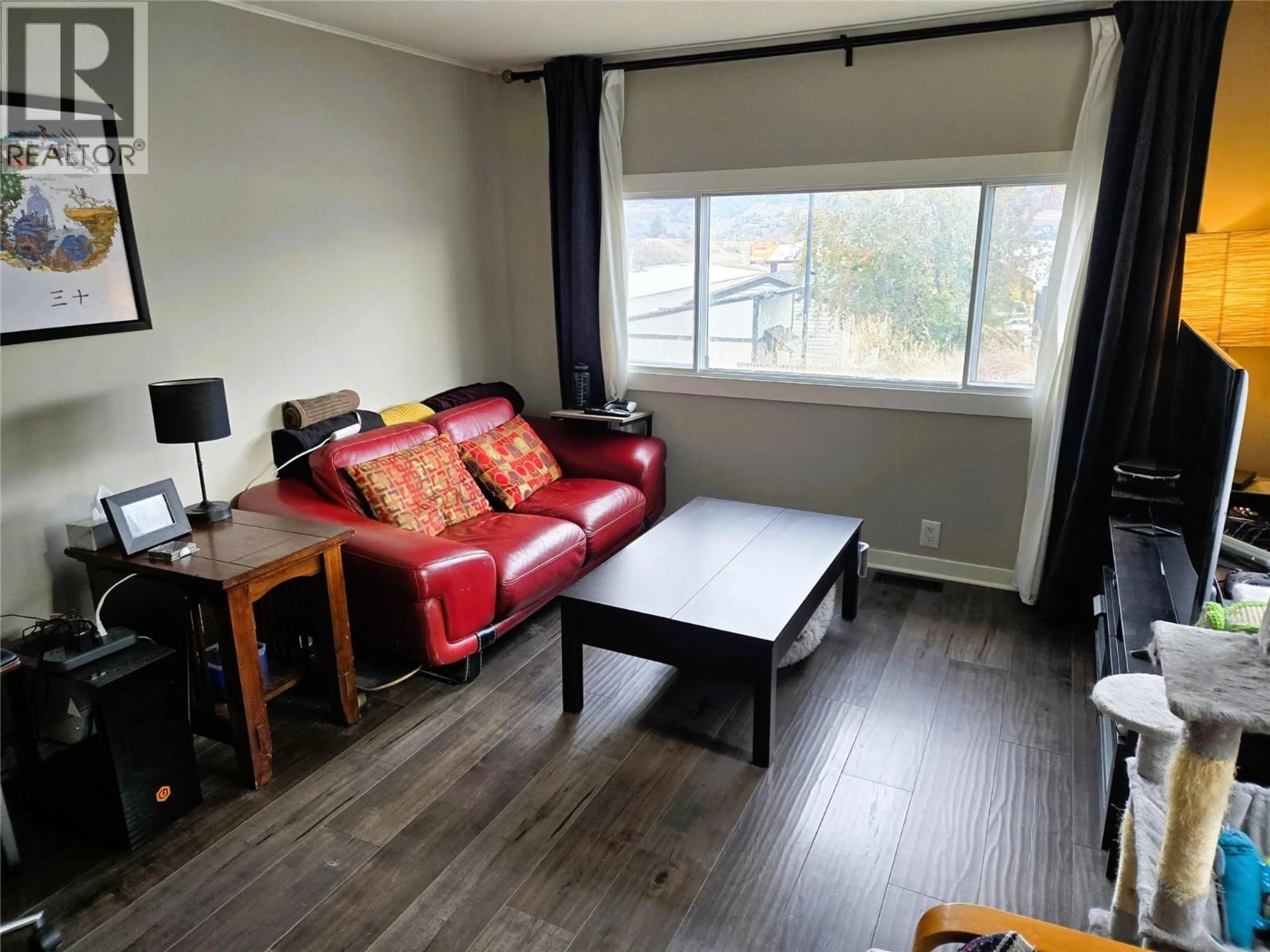 Living room with furniture, wood/laminate floor for 9A RIVA RIDGE ESTATES OTHER, Penticton British Columbia V2A6J7