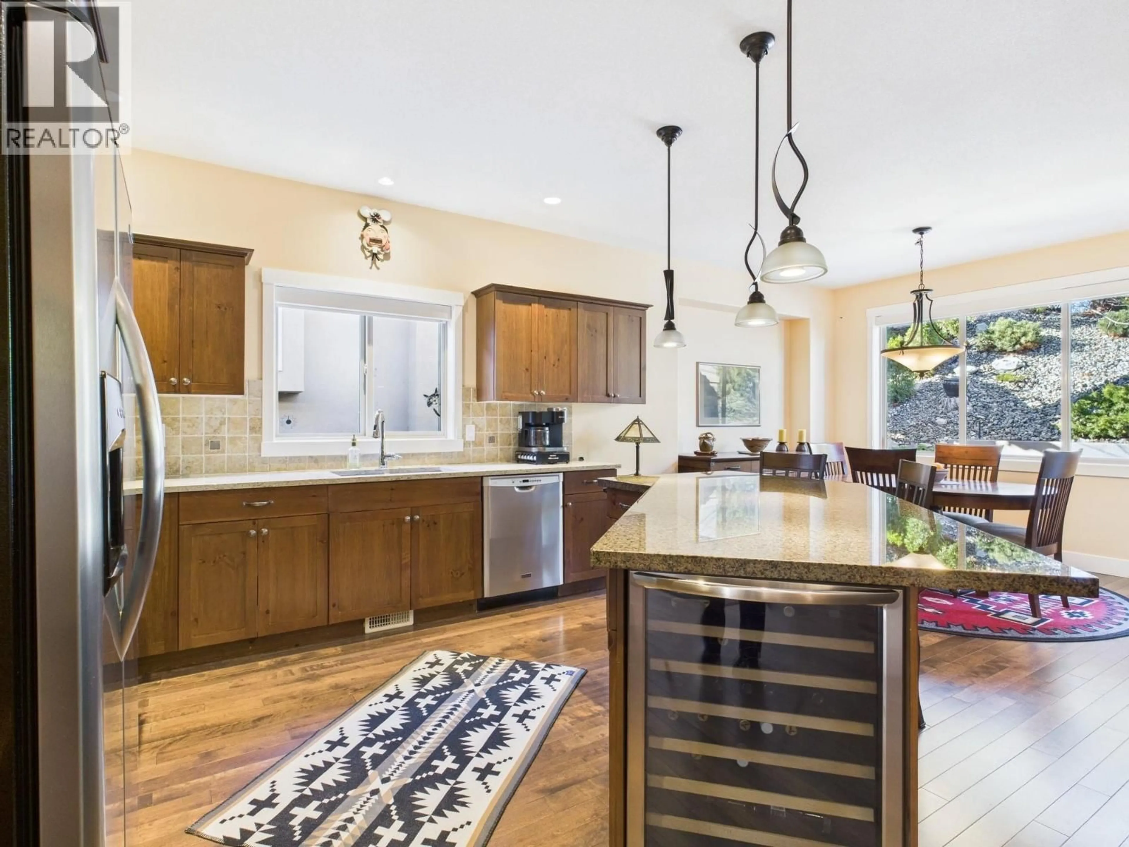 Open concept kitchen, ceramic/tile floor for 12 WILDFLOWER COURT, Osoyoos British Columbia V0H1V1