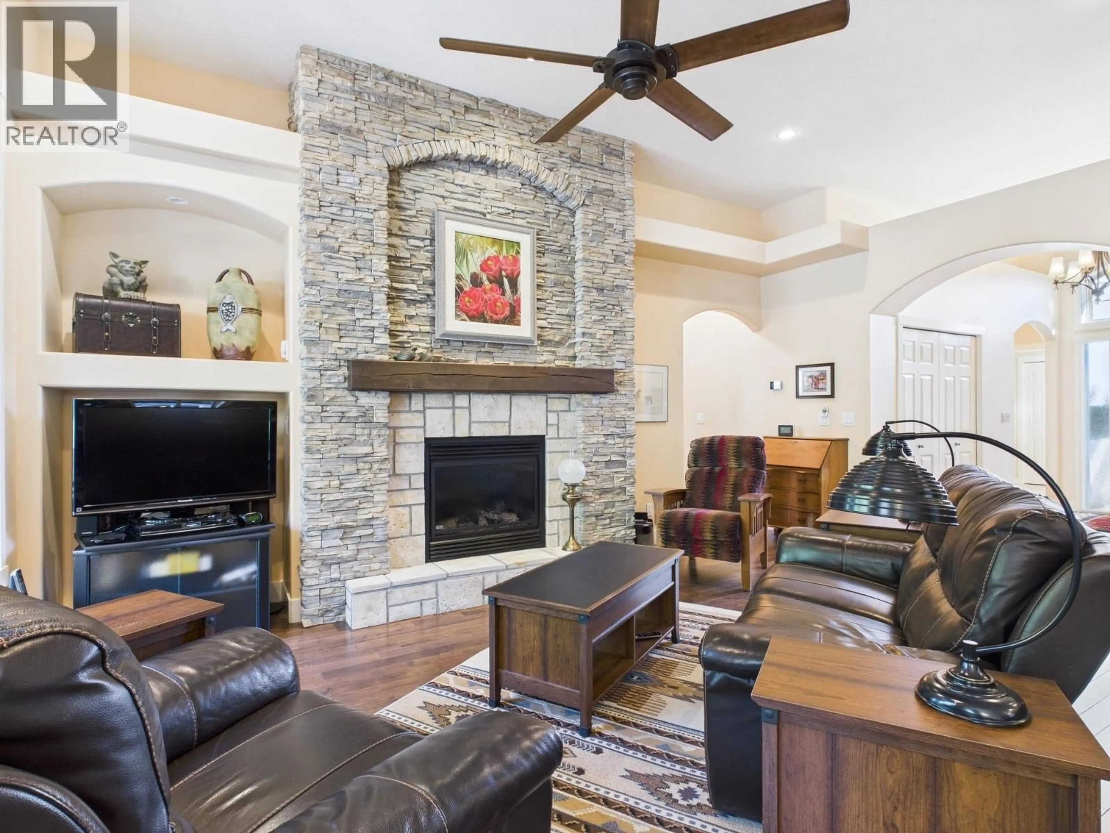 Living room with furniture, ceramic/tile floor for 12 WILDFLOWER COURT, Osoyoos British Columbia V0H1V1