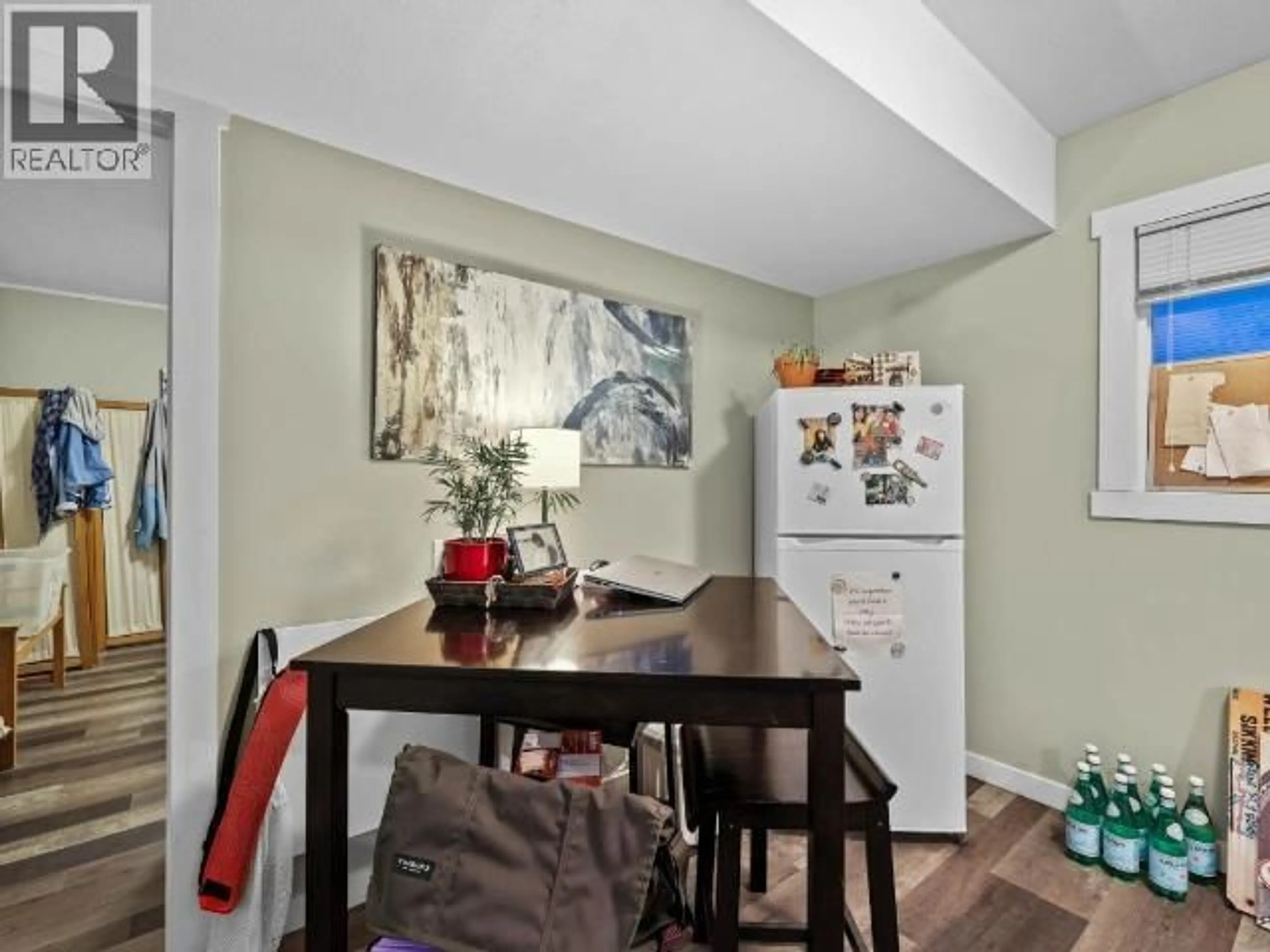 Dining room, wood/laminate floor for 2017 SUNNYCREST AVENUE, Kamloops British Columbia V2B4L9
