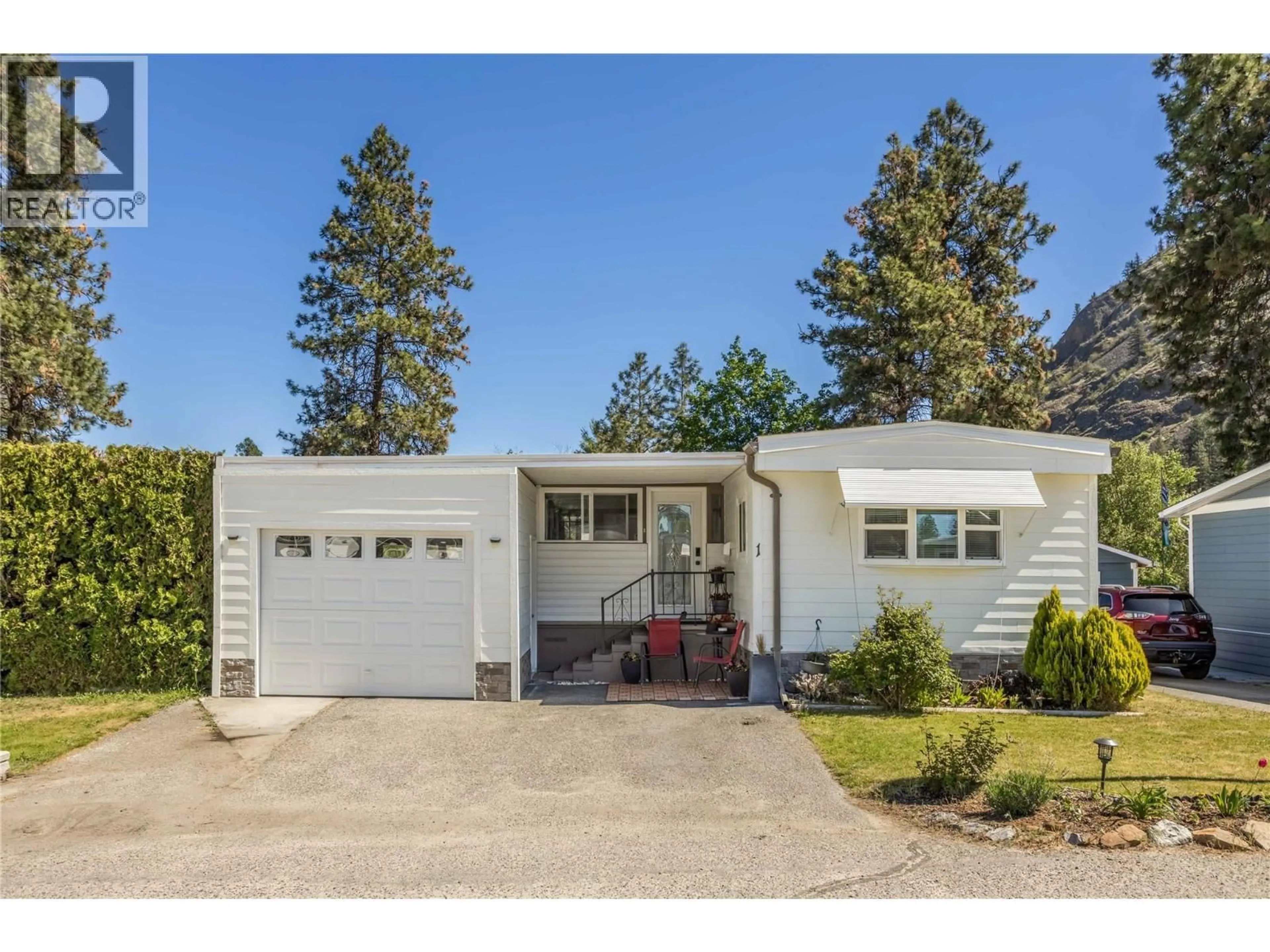 Home with vinyl exterior material, street for 1 - 1929 HIGHWAY 97 S OTHER, Kelowna British Columbia V1Z2Z1