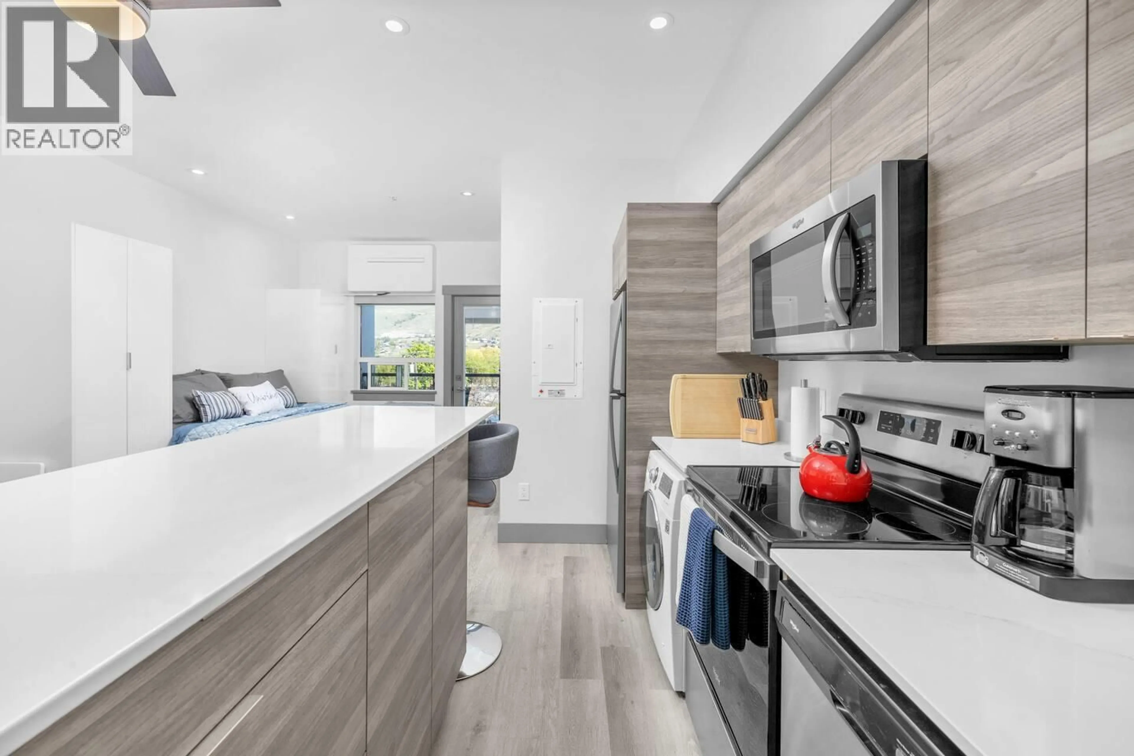 Open concept kitchen, ceramic/tile floor for 406 - 2555 LAKESHORE ROAD, Vernon British Columbia V1H1M9