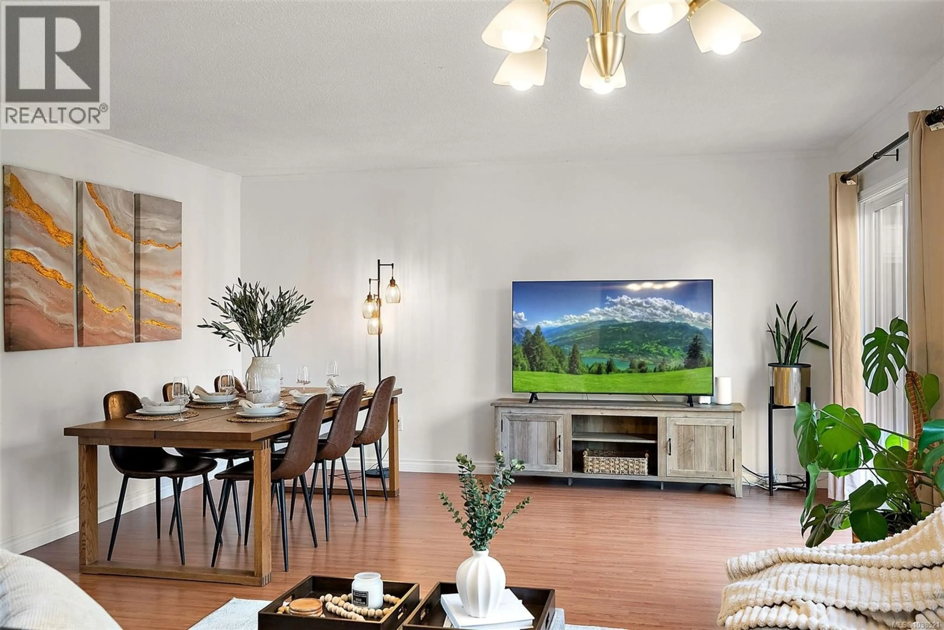 Living room with furniture, wood/laminate floor for A - 3100 VOLMER ROAD, Colwood British Columbia V9B2H6