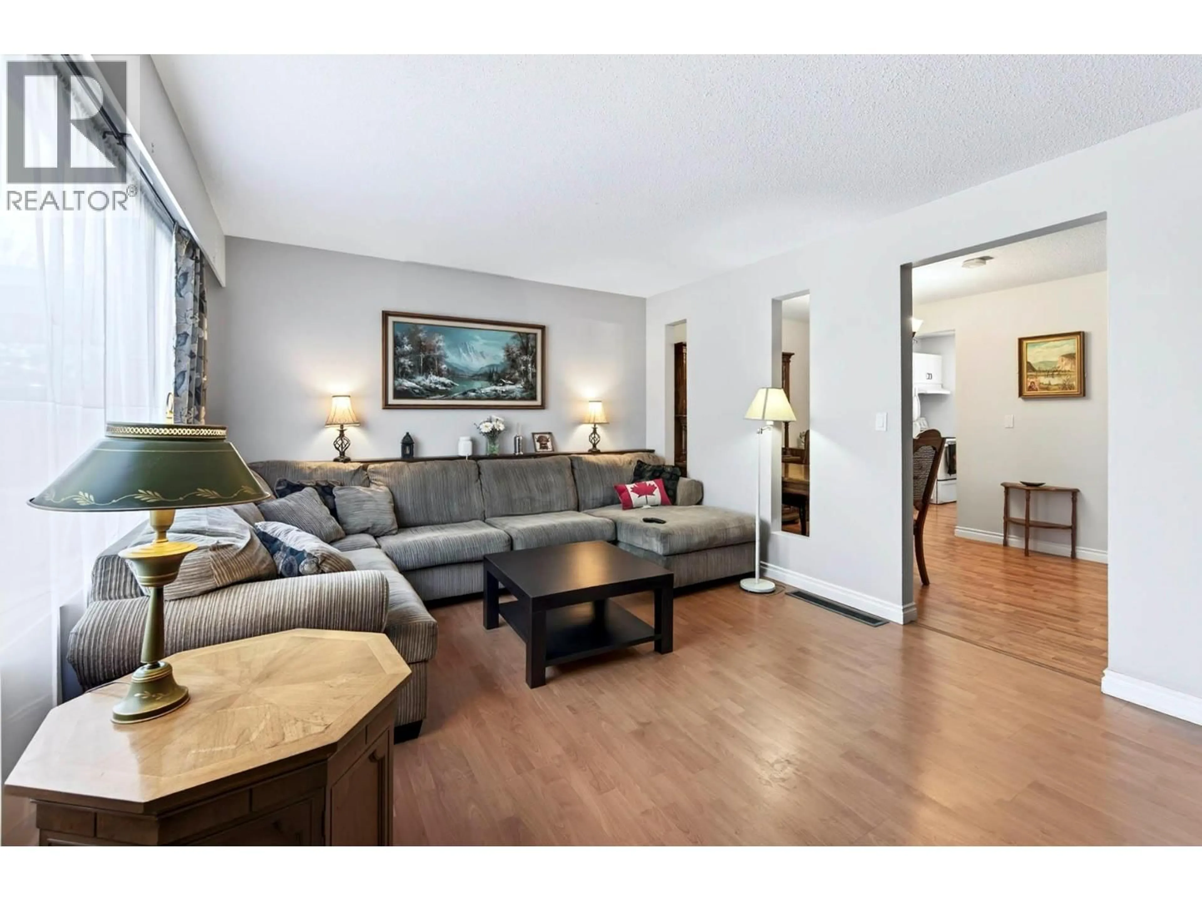 Living room with furniture, wood/laminate floor for 59 - 800 SOUTHILL STREET, Kamloops British Columbia V2B5L8