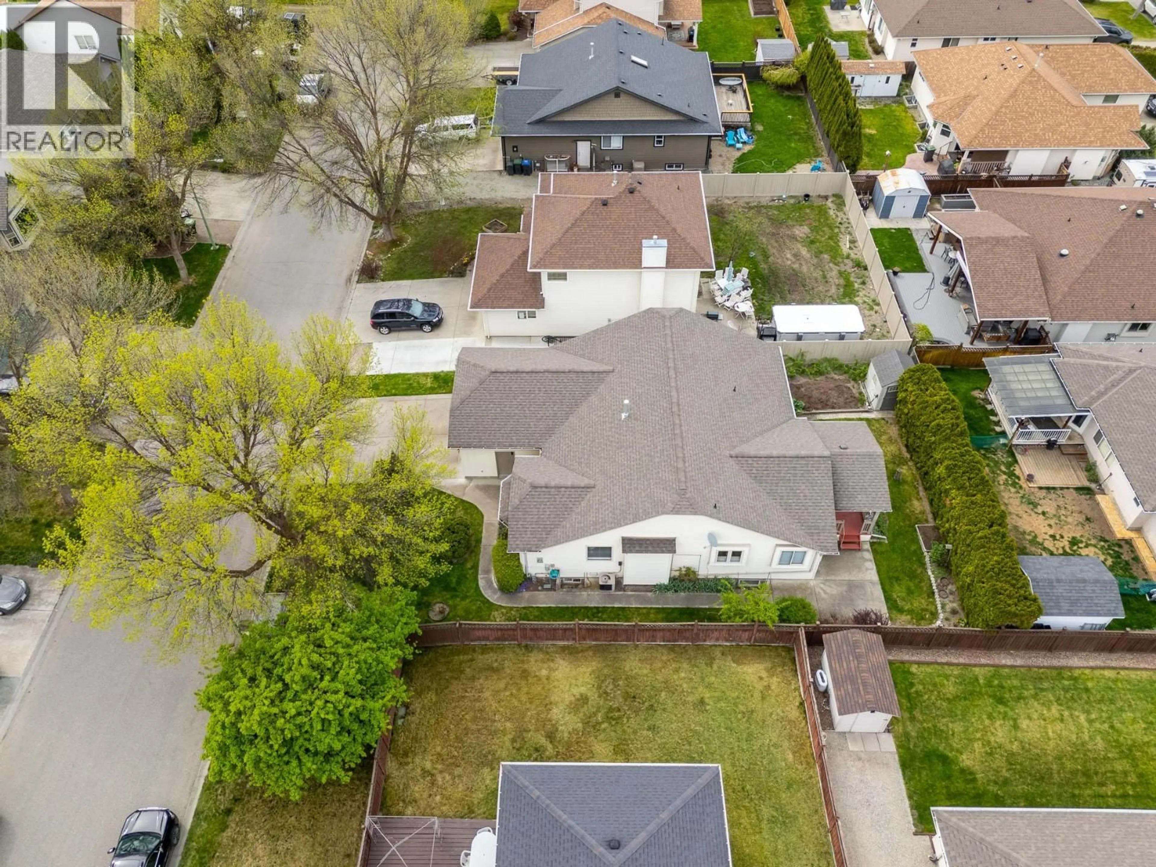 A pic from outside/outdoor area/front of a property/back of a property/a pic from drone, street for 380 MURRAY CRESCENT, Kelowna British Columbia V1X7P7