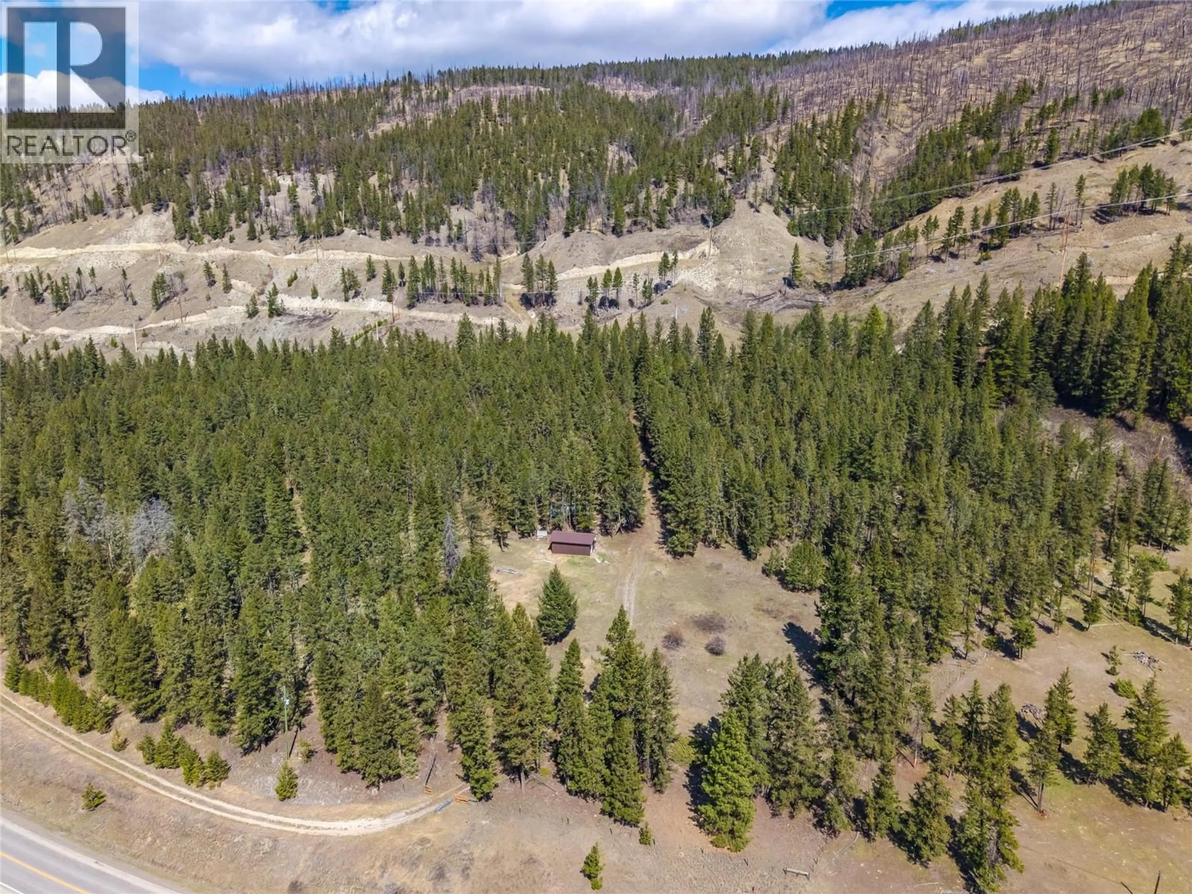 A pic from outside/outdoor area/front of a property/back of a property/a pic from drone, forest/trees view for 6696 CARIBOO HIGHWAY 97 OTHER, Clinton British Columbia V0K1K0