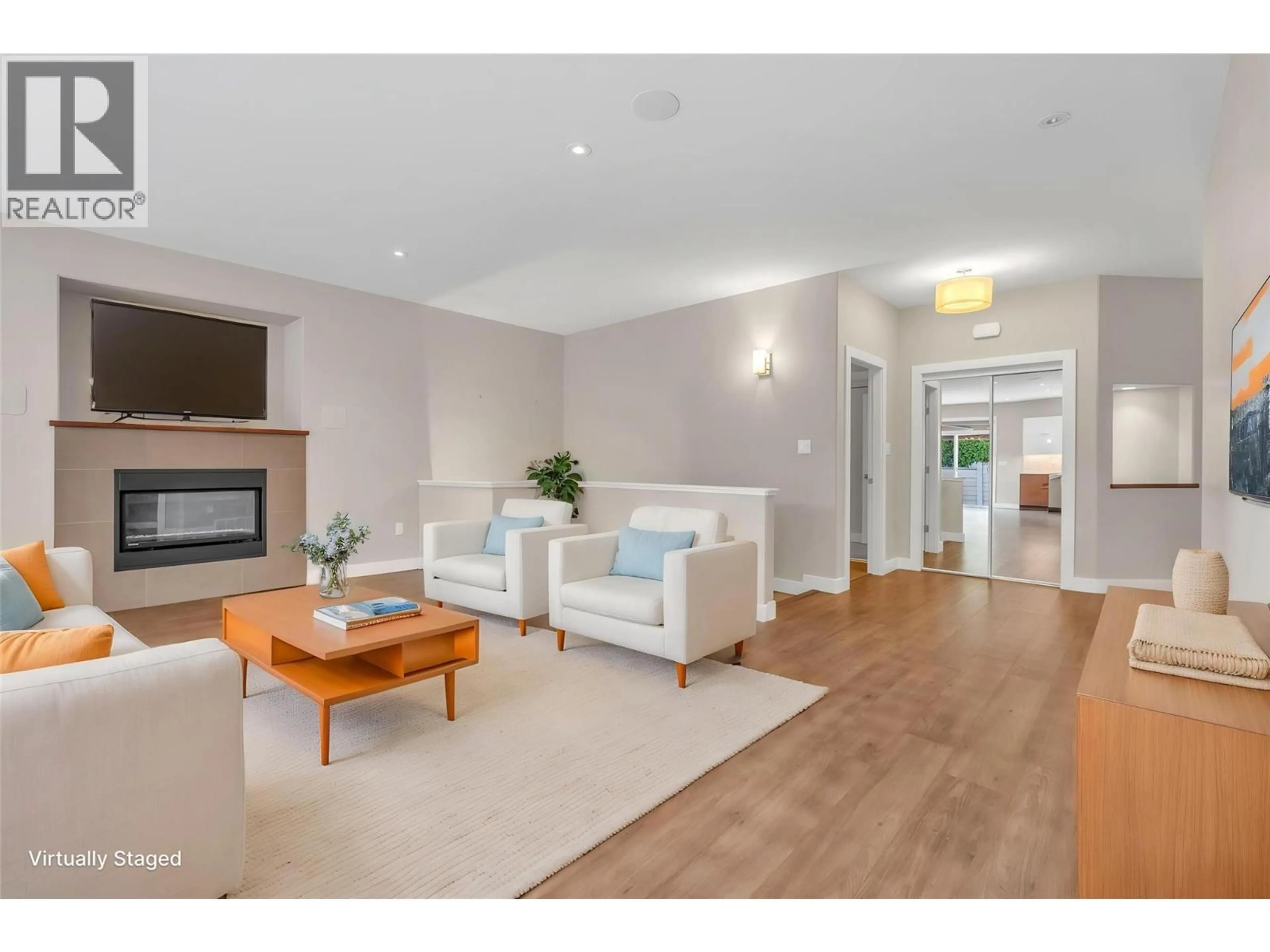 Living room with furniture, wood/laminate floor for 169 - 170 STOCKS CRESCENT, Penticton British Columbia V2A9C6