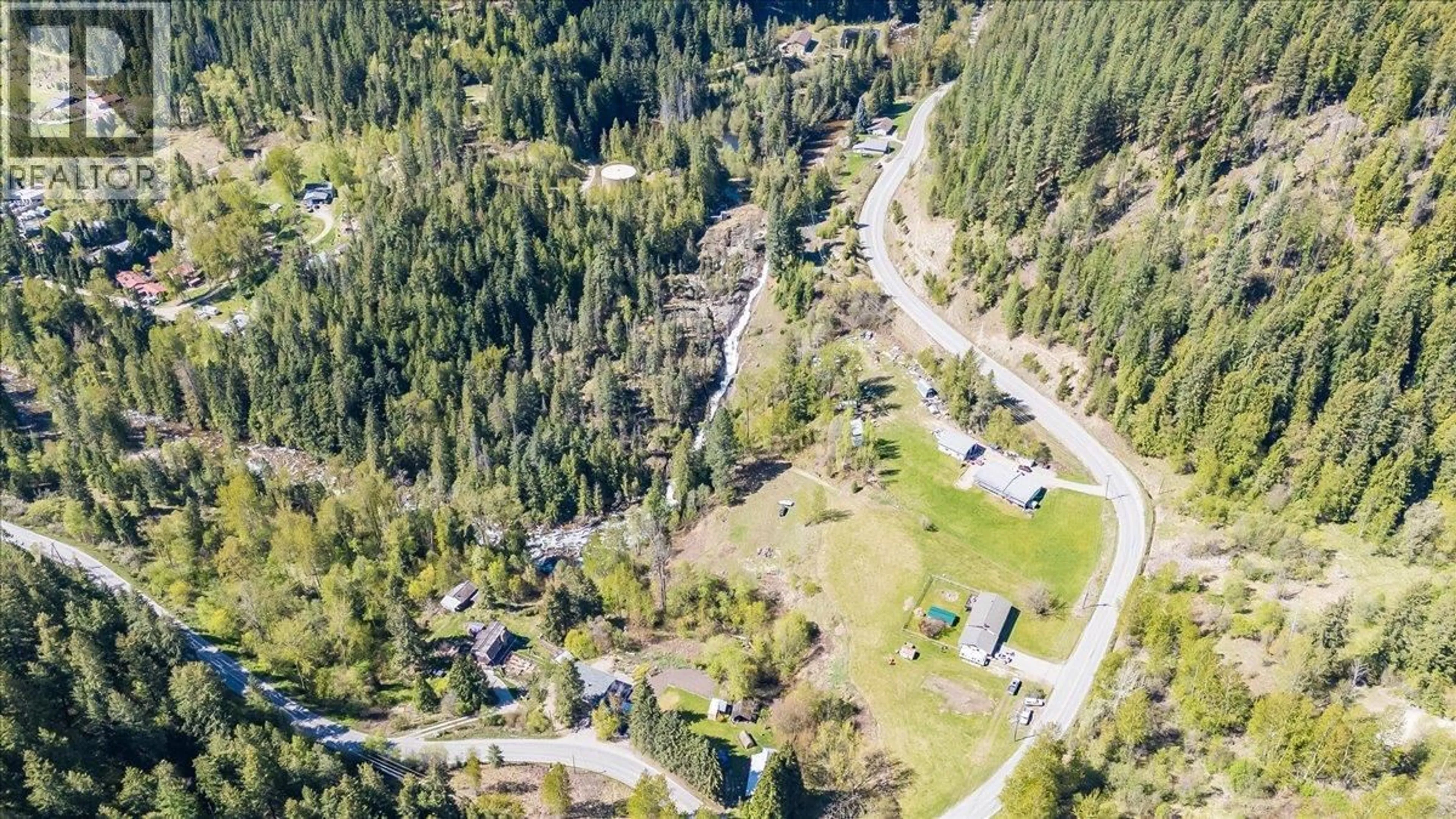 A pic from outside/outdoor area/front of a property/back of a property/a pic from drone, street for 1448 PASS CREEK ROAD, Castlegar British Columbia V1N4S2