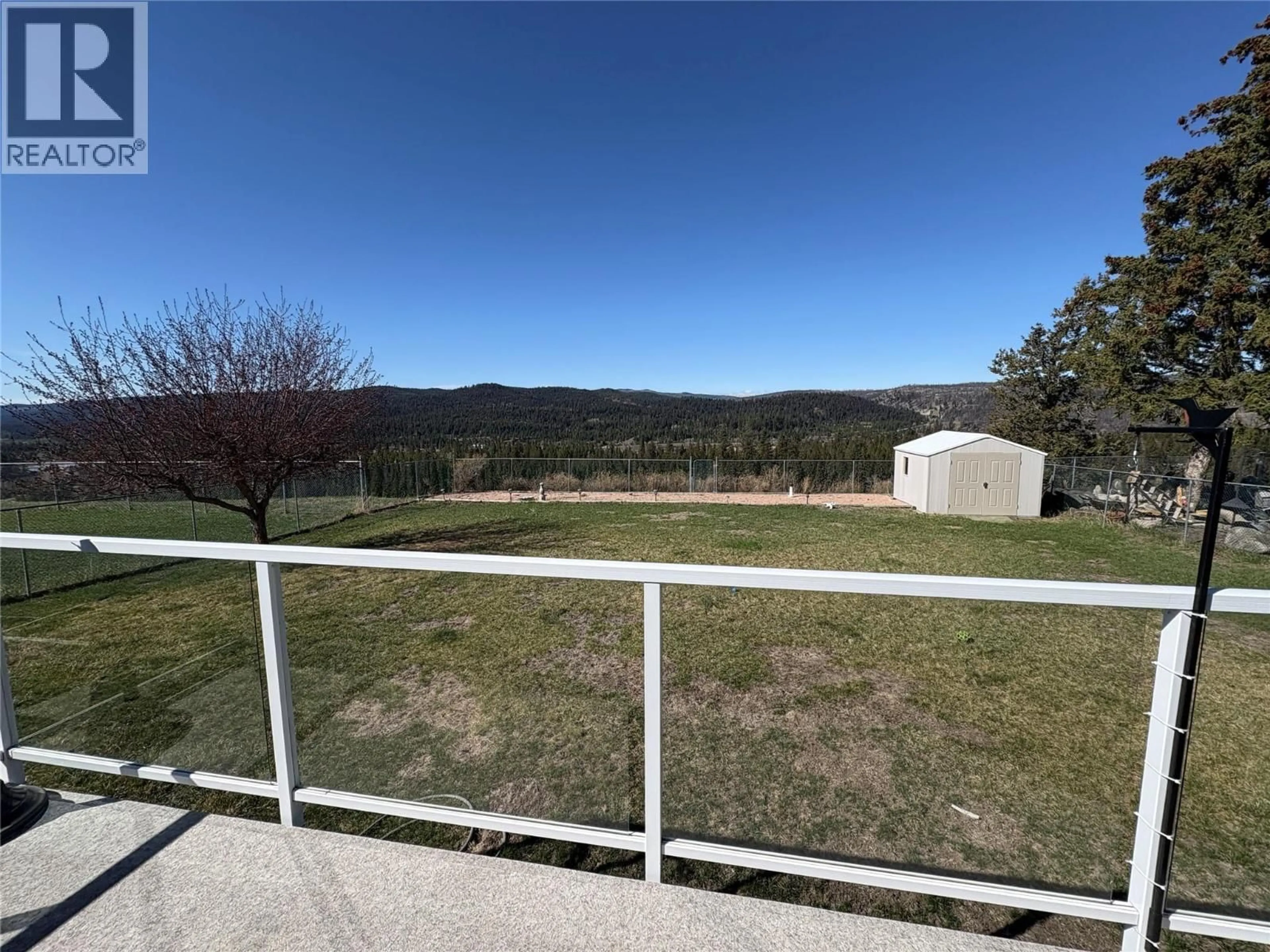 A pic from outside/outdoor area/front of a property/back of a property/a pic from drone, mountain view for 438 OPAL DRIVE, Logan Lake British Columbia V0K1W0