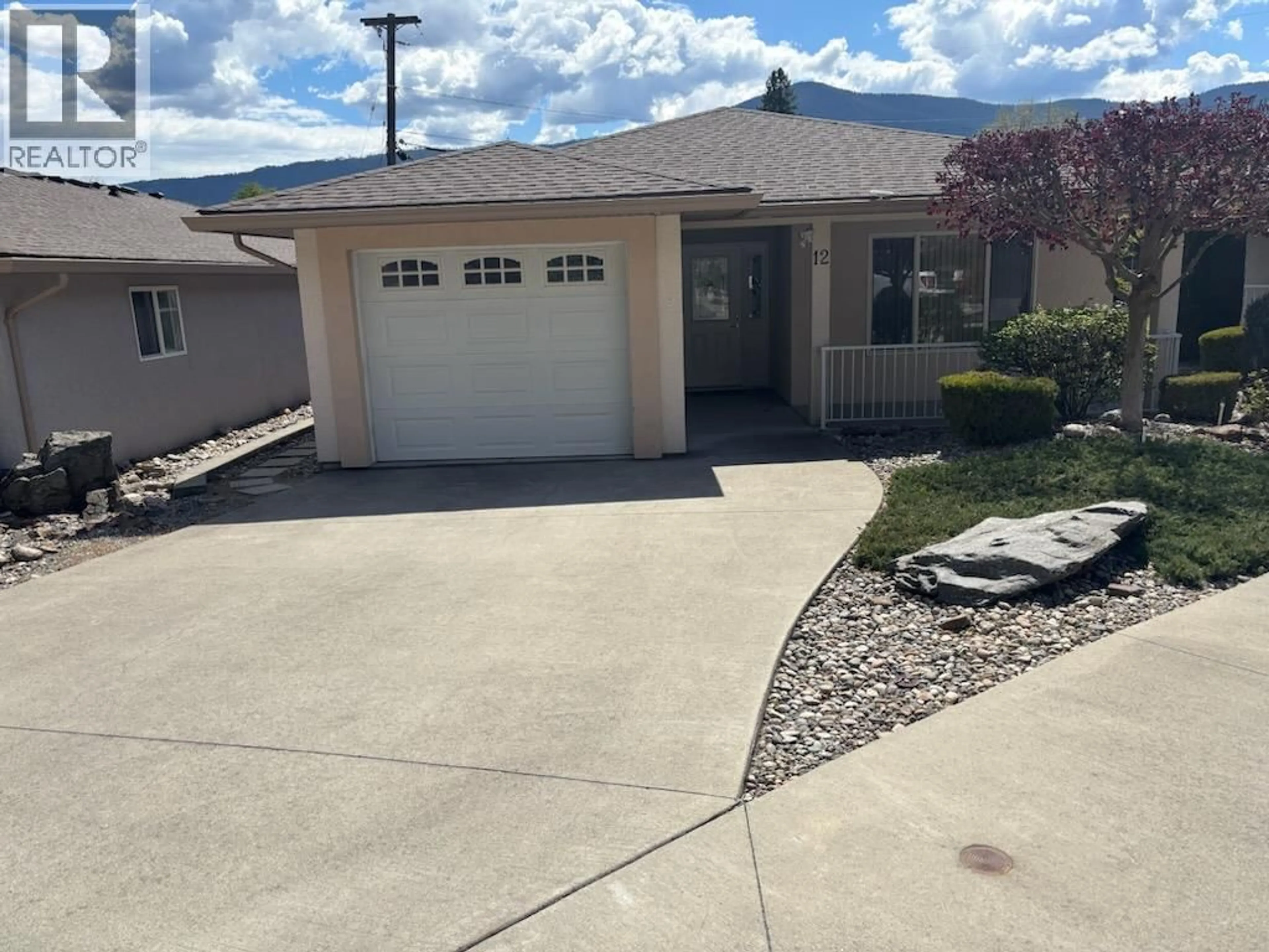 Home with vinyl exterior material, street for #12 707 76TH AVENUE, Grand Forks British Columbia V0H1H0