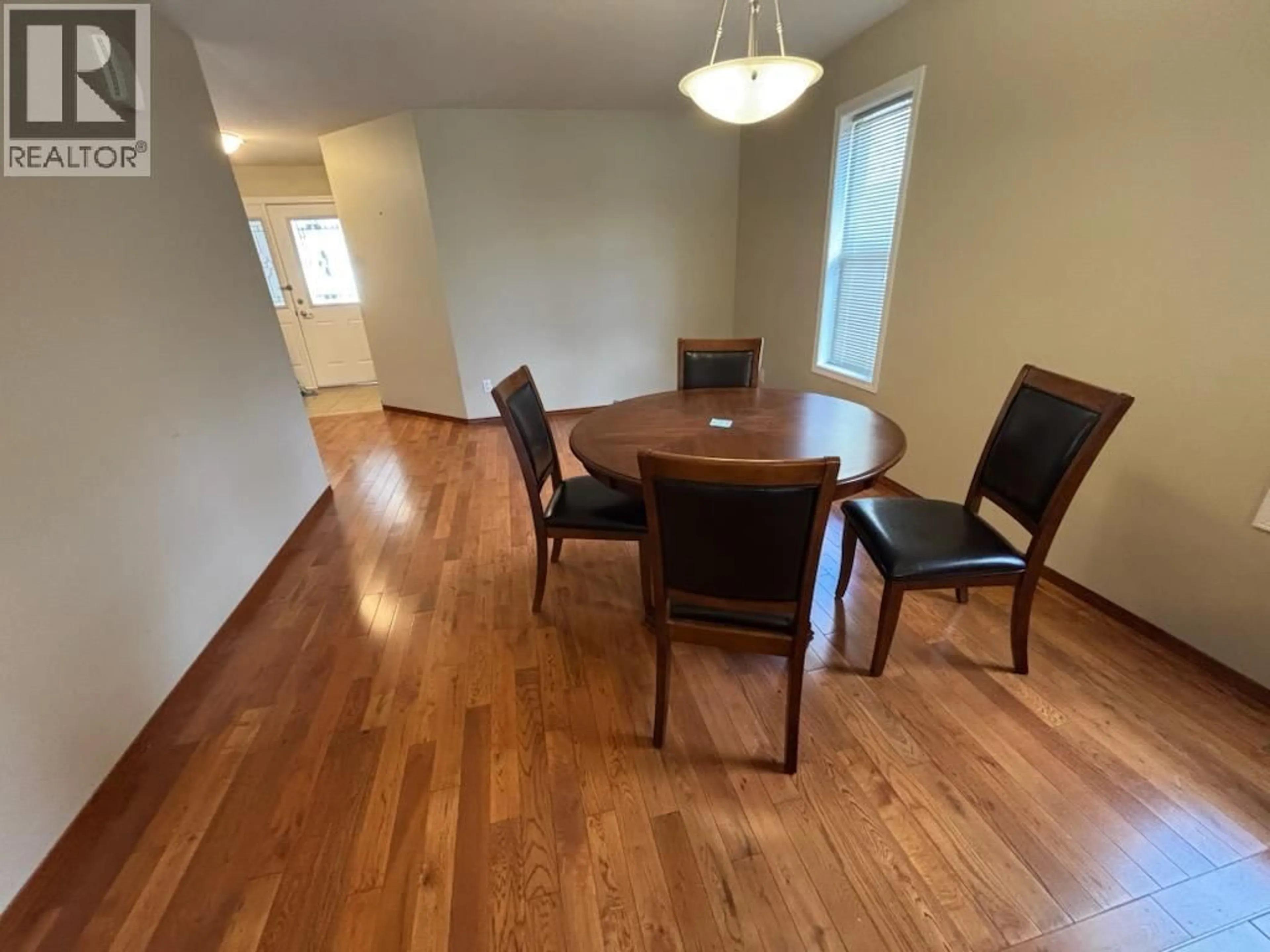 Dining room, wood/laminate floor for #12 707 76TH AVENUE, Grand Forks British Columbia V0H1H0