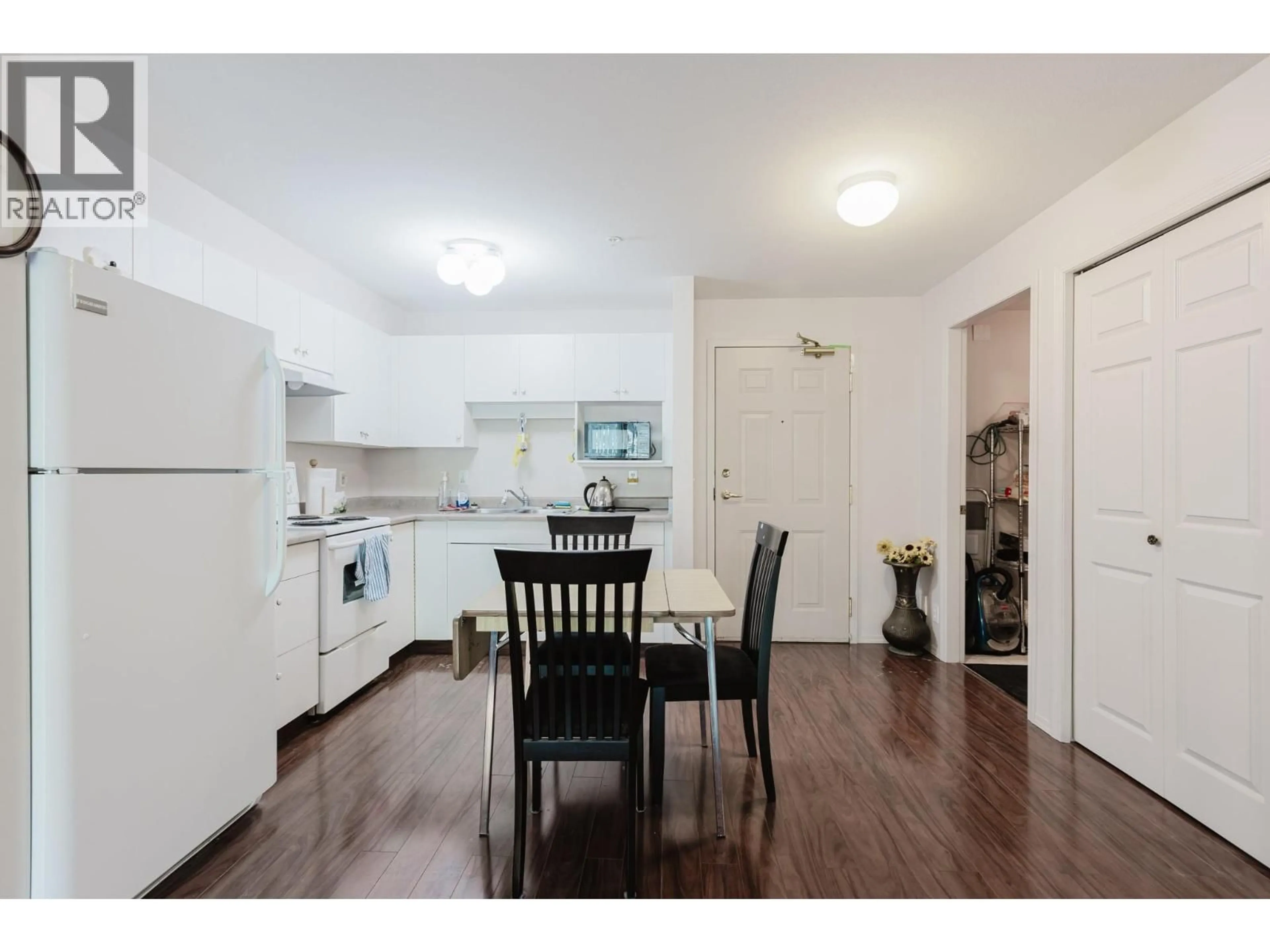 Standard kitchen, wood/laminate floor for 205 - 920 SASKATOON ROAD, Kelowna British Columbia V1X7P8