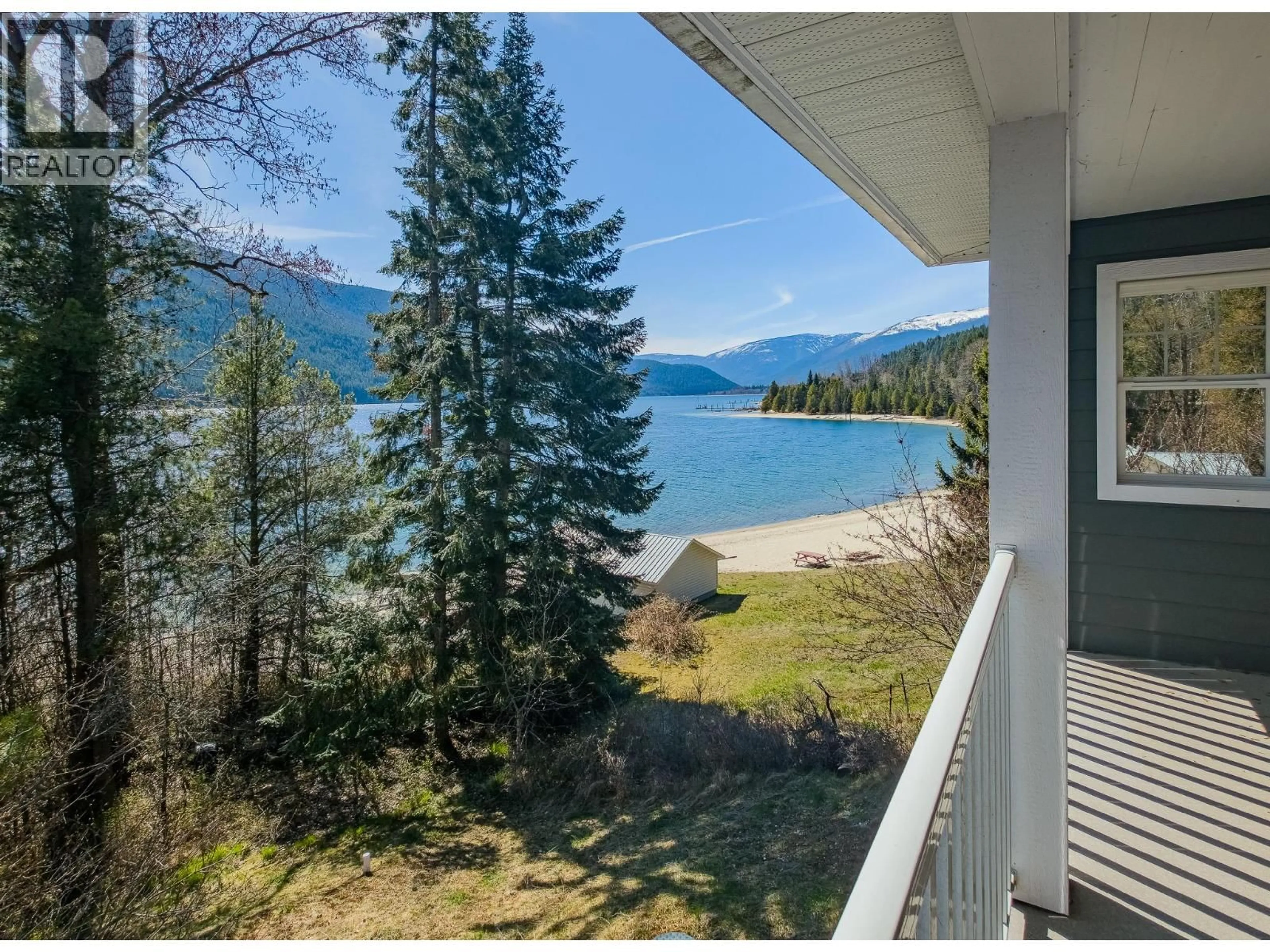 A pic from outside/outdoor area/front of a property/back of a property/a pic from drone, water/lake/river/ocean view for 5916 HIGHWAY 3A HIGHWAY, Balfour British Columbia V2Y1M2