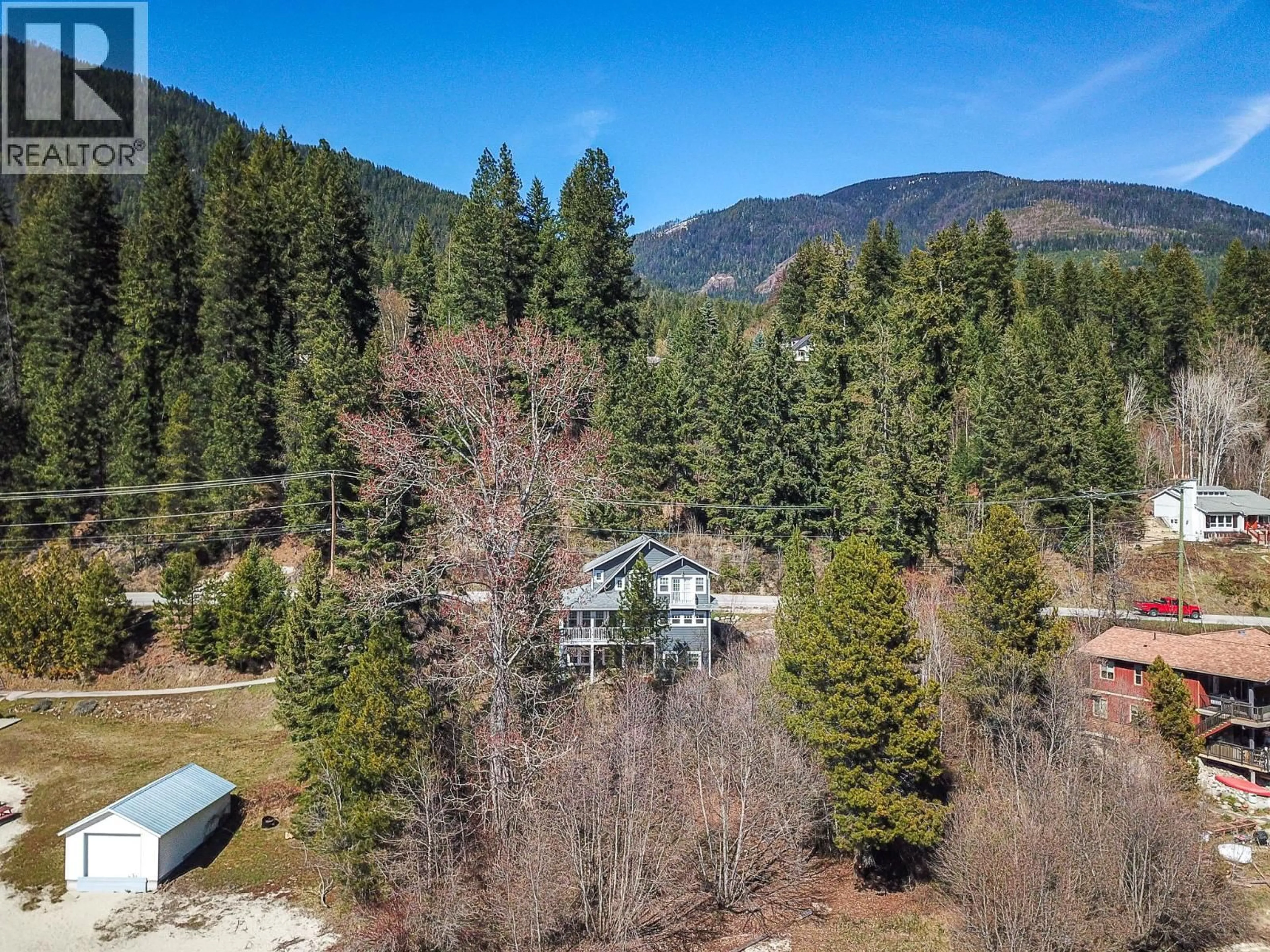 A pic from outside/outdoor area/front of a property/back of a property/a pic from drone, forest/trees view for 5916 HIGHWAY 3A HIGHWAY, Balfour British Columbia V2Y1M2
