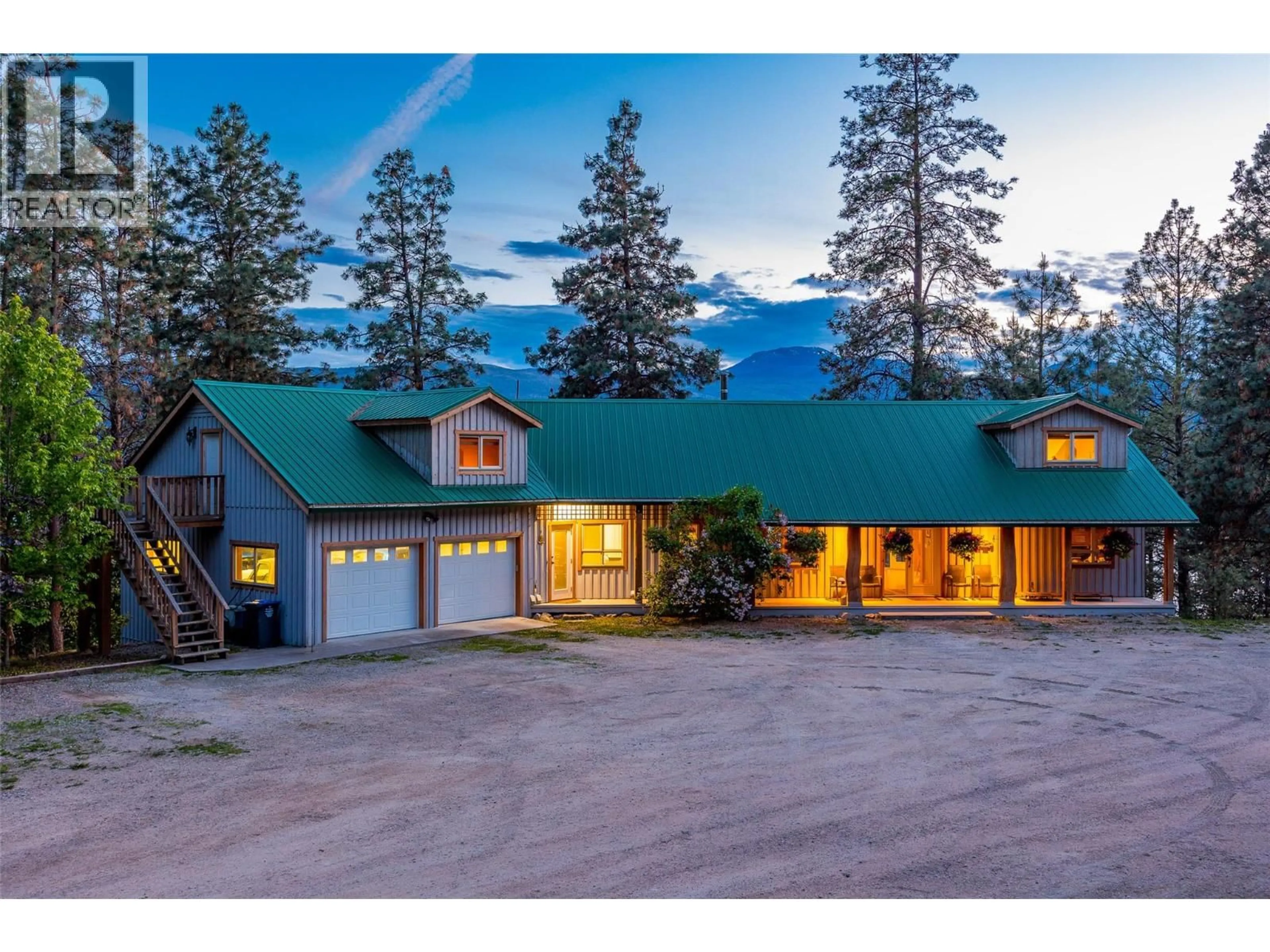 A pic from outside/outdoor area/front of a property/back of a property/a pic from drone, mountain view for 17142 COMMONAGE ROAD, Lake Country British Columbia V4V1B5