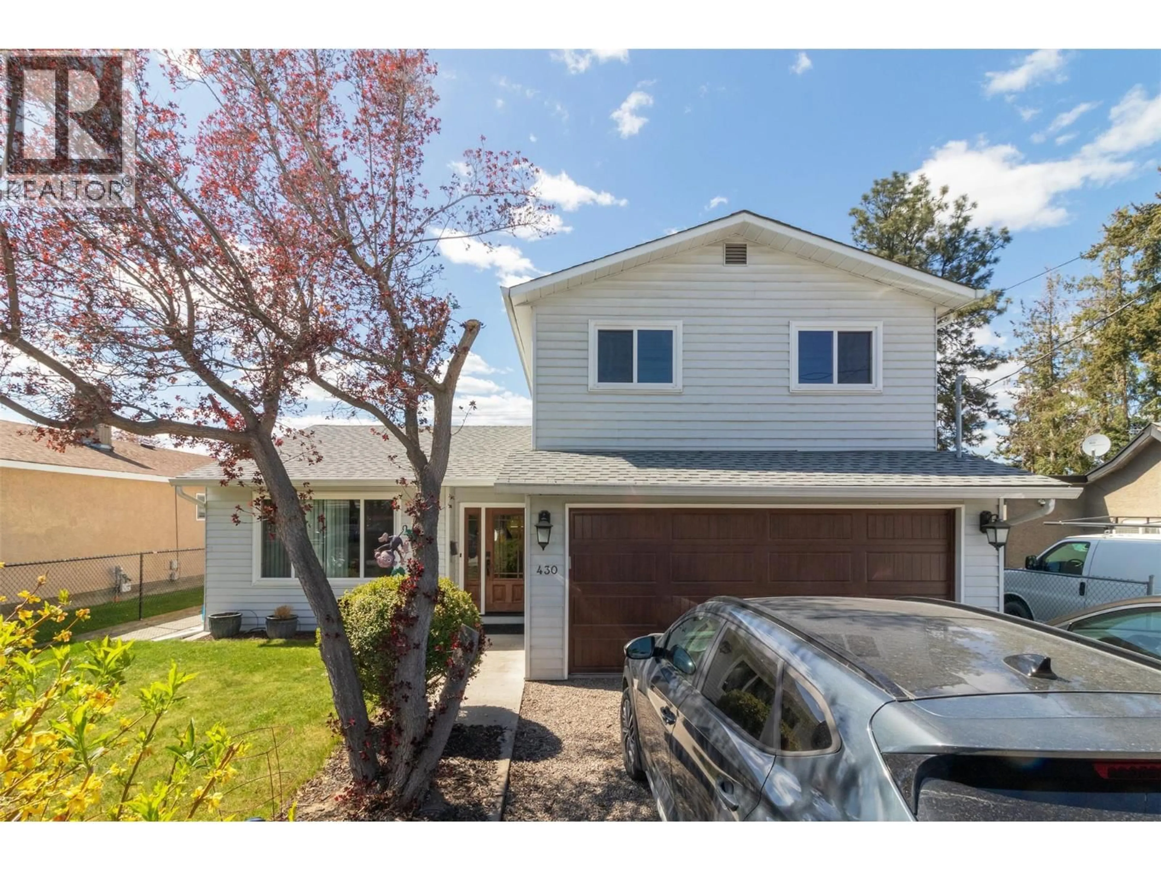 Home with vinyl exterior material, street for 430 DOUGALL ROAD NORTH, Kelowna British Columbia V1X3K7