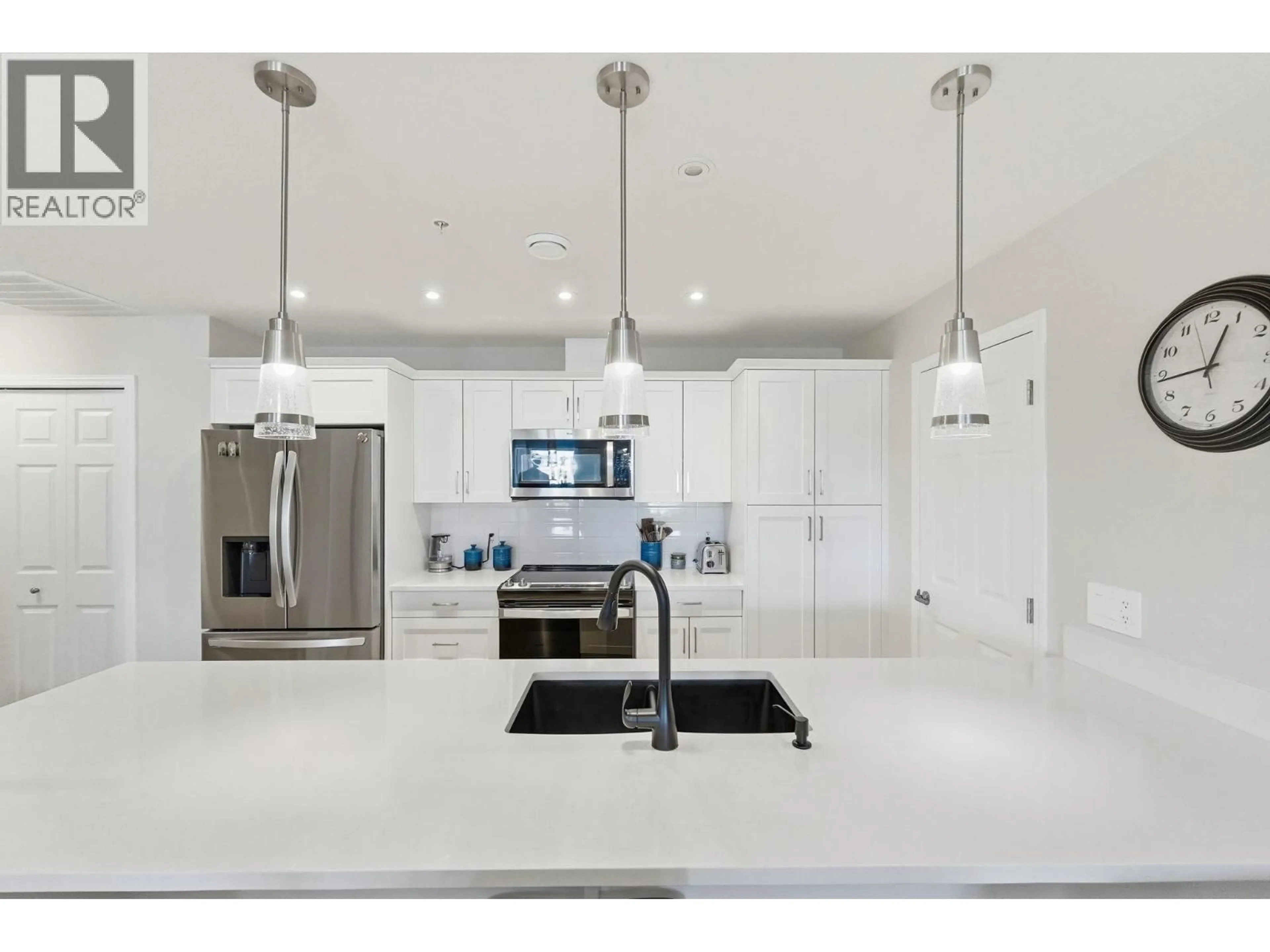 Contemporary kitchen, ceramic/tile floor for 502 - 3362 SKAHA LAKE ROAD, Penticton British Columbia V2A6G4