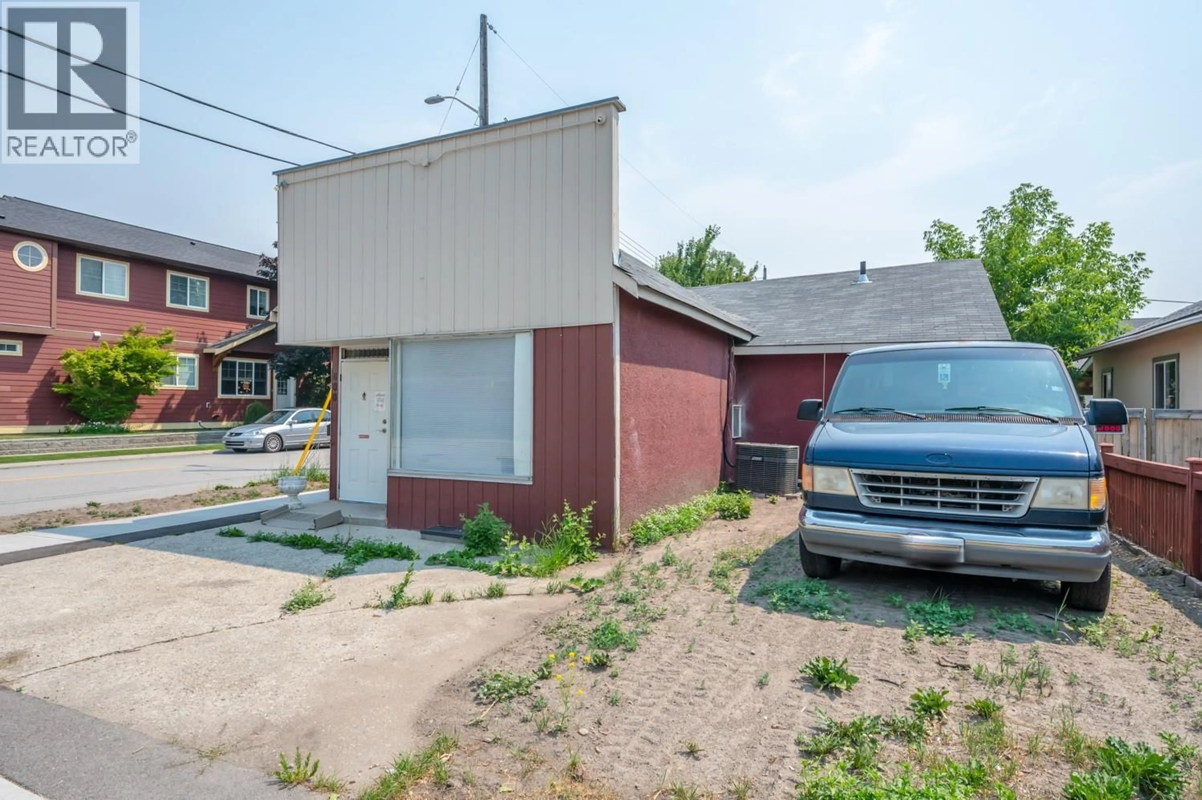 A pic from outside/outdoor area/front of a property/back of a property/a pic from drone, street for 600 WADE AVENUE WEST, Penticton British Columbia V2A1V7