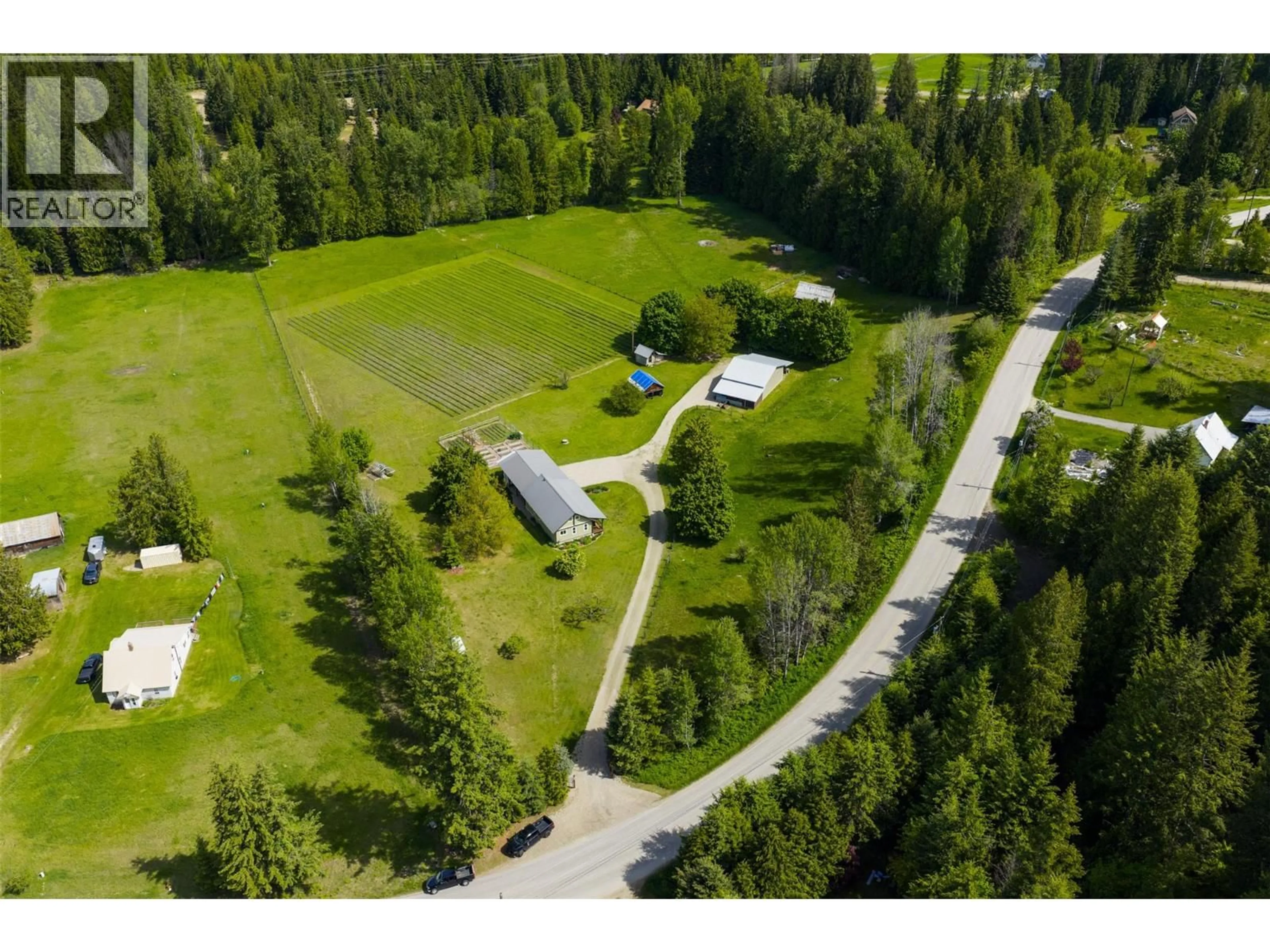 A pic from outside/outdoor area/front of a property/back of a property/a pic from drone, unknown for 4240 BLEWETT ROAD, Nelson British Columbia V1L6X2