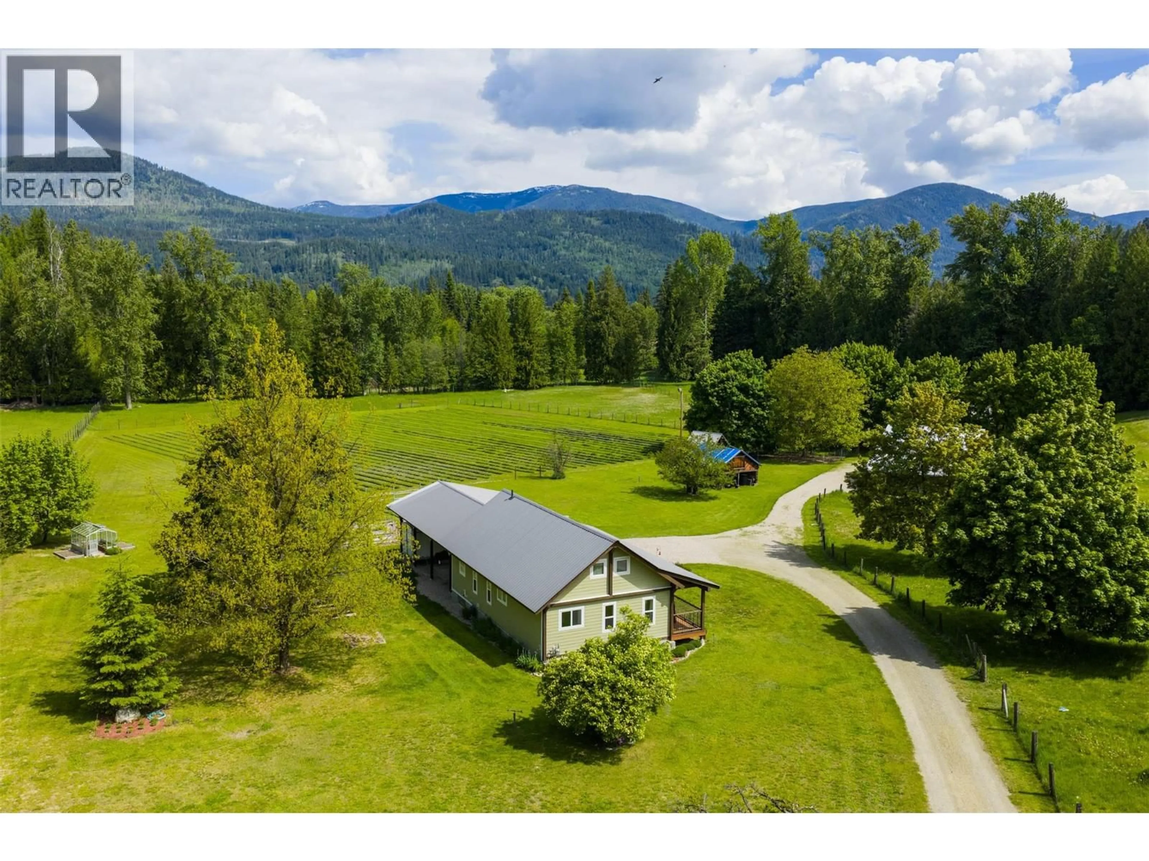 A pic from outside/outdoor area/front of a property/back of a property/a pic from drone, mountain view for 4240 BLEWETT ROAD, Nelson British Columbia V1L6X2