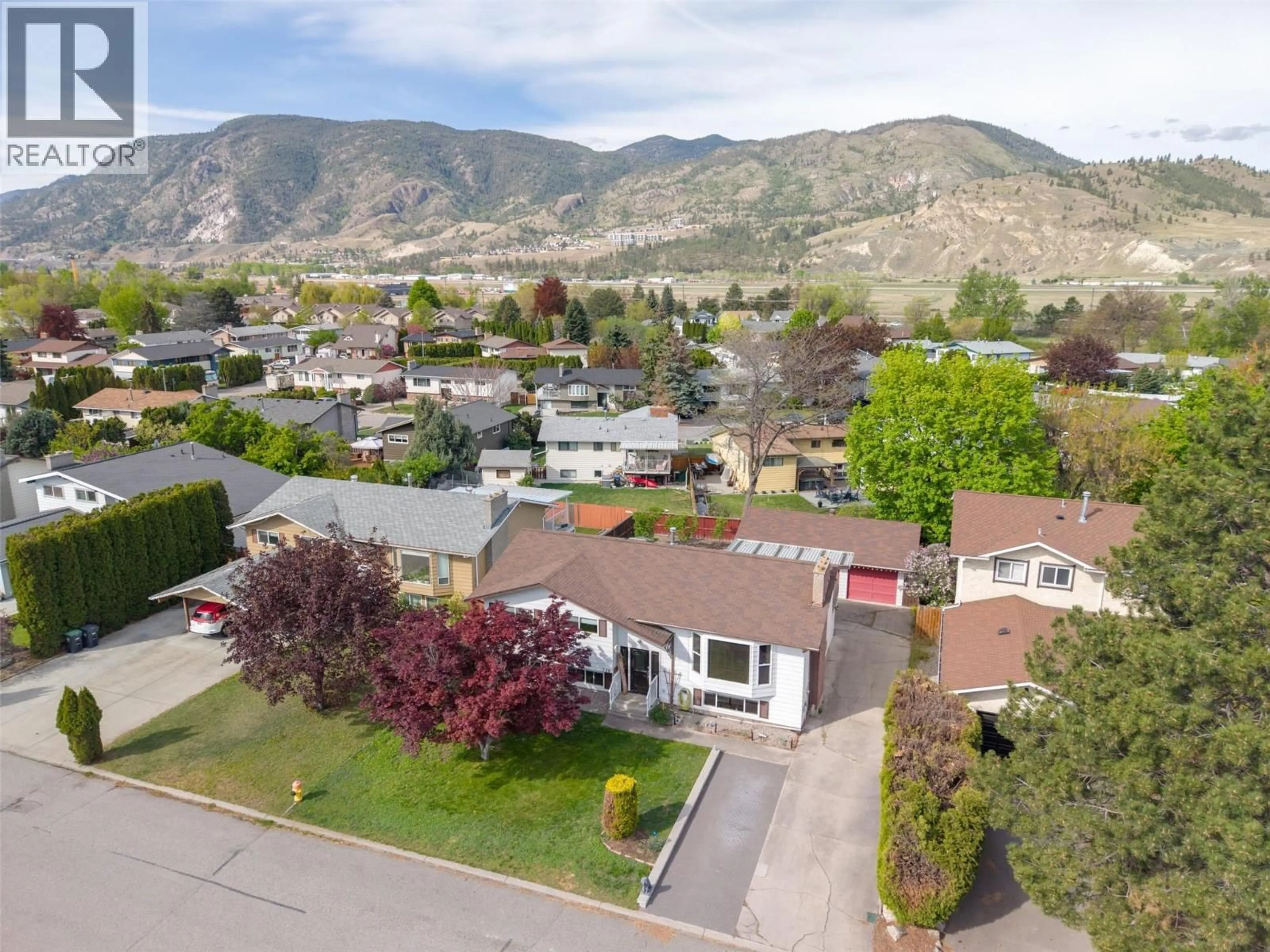 A pic from outside/outdoor area/front of a property/back of a property/a pic from drone, mountain view for 118 MURRAY DRIVE, Penticton British Columbia V2A7E4