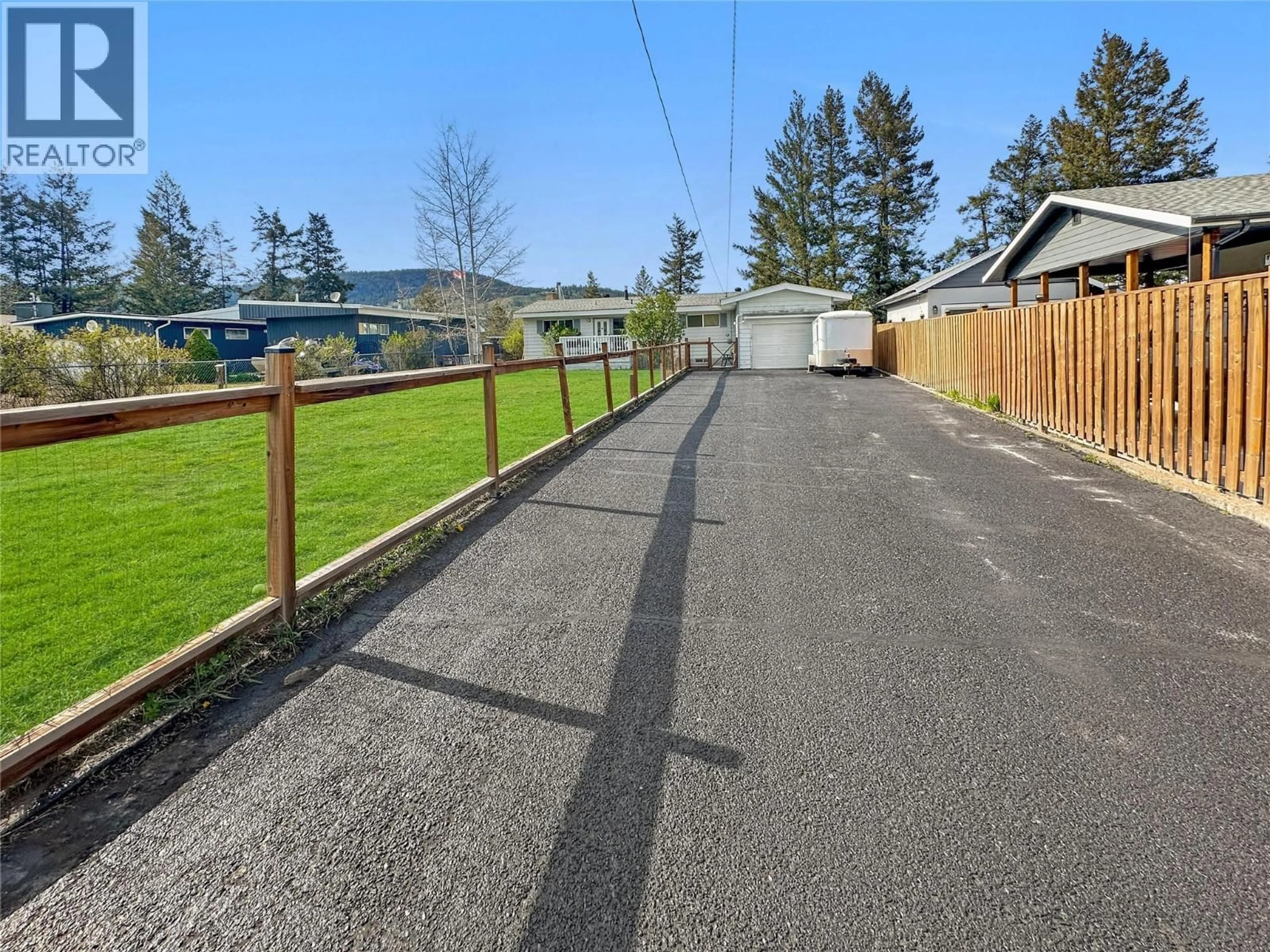 A pic from outside/outdoor area/front of a property/back of a property/a pic from drone, street for 305 PANORAMA CRESCENT, Princeton British Columbia V0X1W0