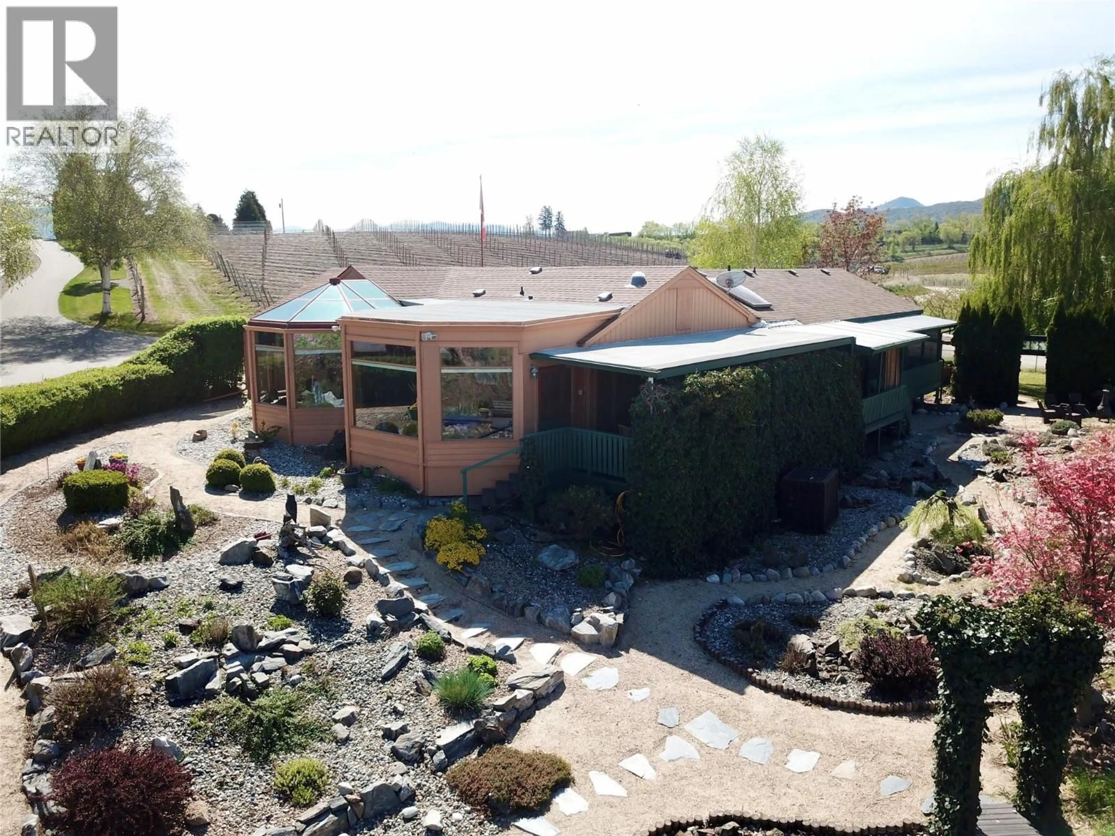 A pic from outside/outdoor area/front of a property/back of a property/a pic from drone, unknown for 15230 89TH STREET, Osoyoos British Columbia V0H1V2