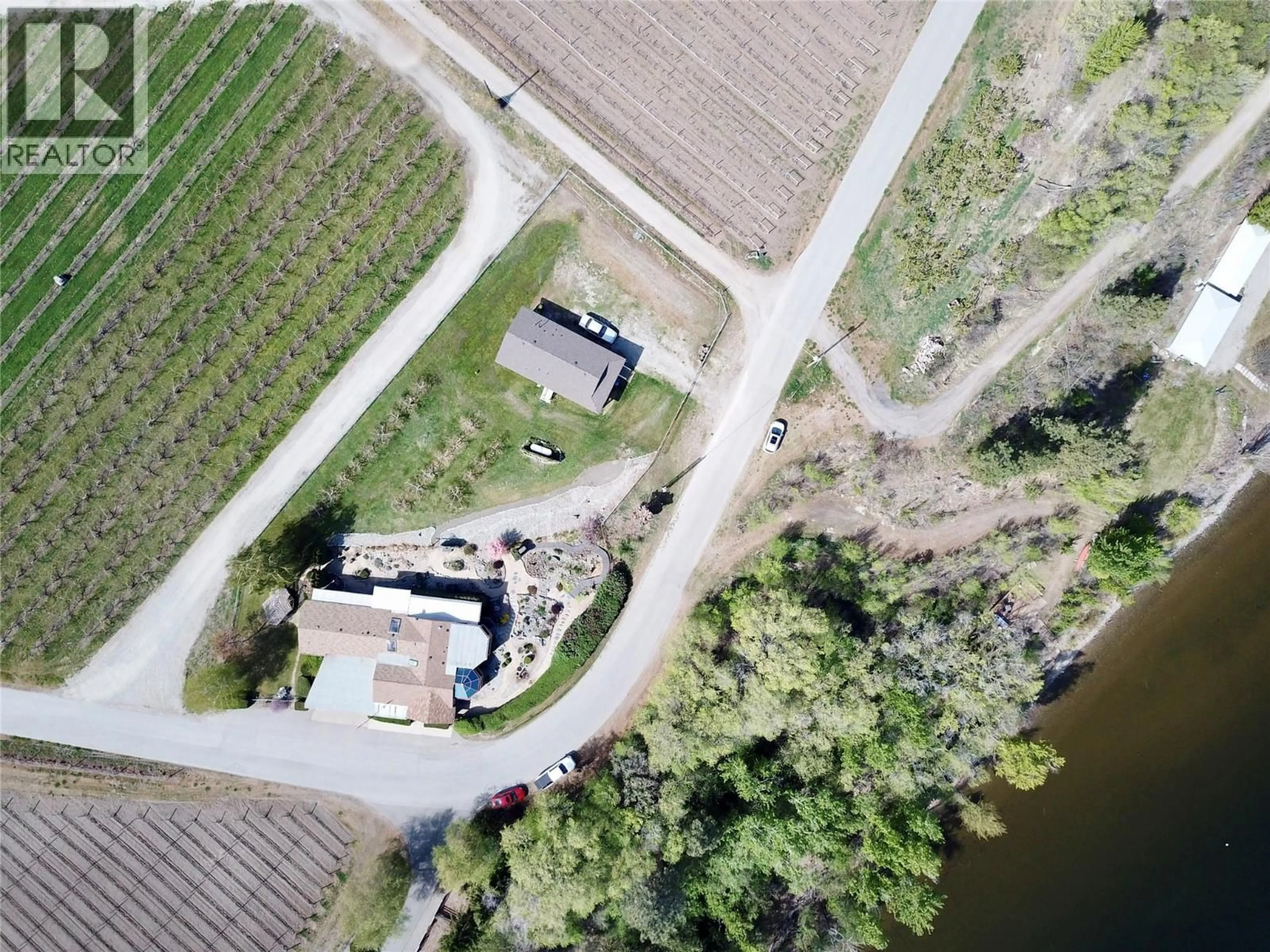 A pic from outside/outdoor area/front of a property/back of a property/a pic from drone, street for 15230 89TH STREET, Osoyoos British Columbia V0H1V2