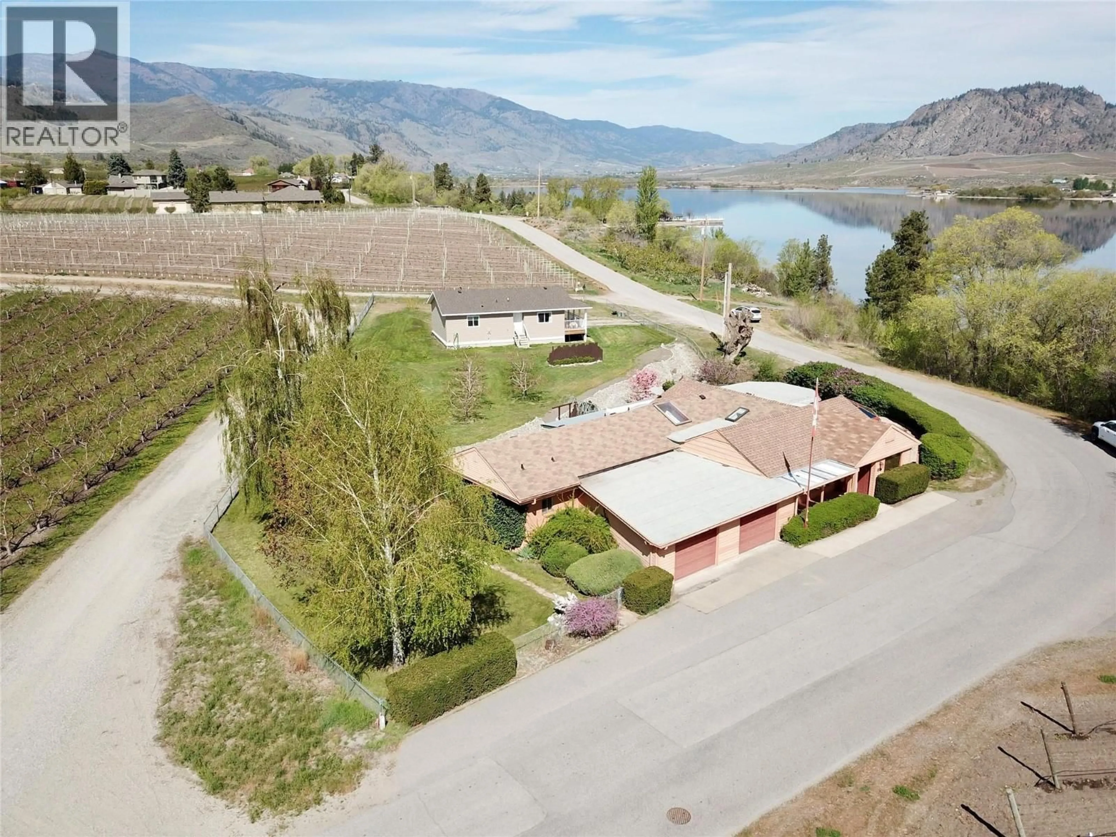 A pic from outside/outdoor area/front of a property/back of a property/a pic from drone, water/lake/river/ocean view for 15230 89TH STREET, Osoyoos British Columbia V0H1V2
