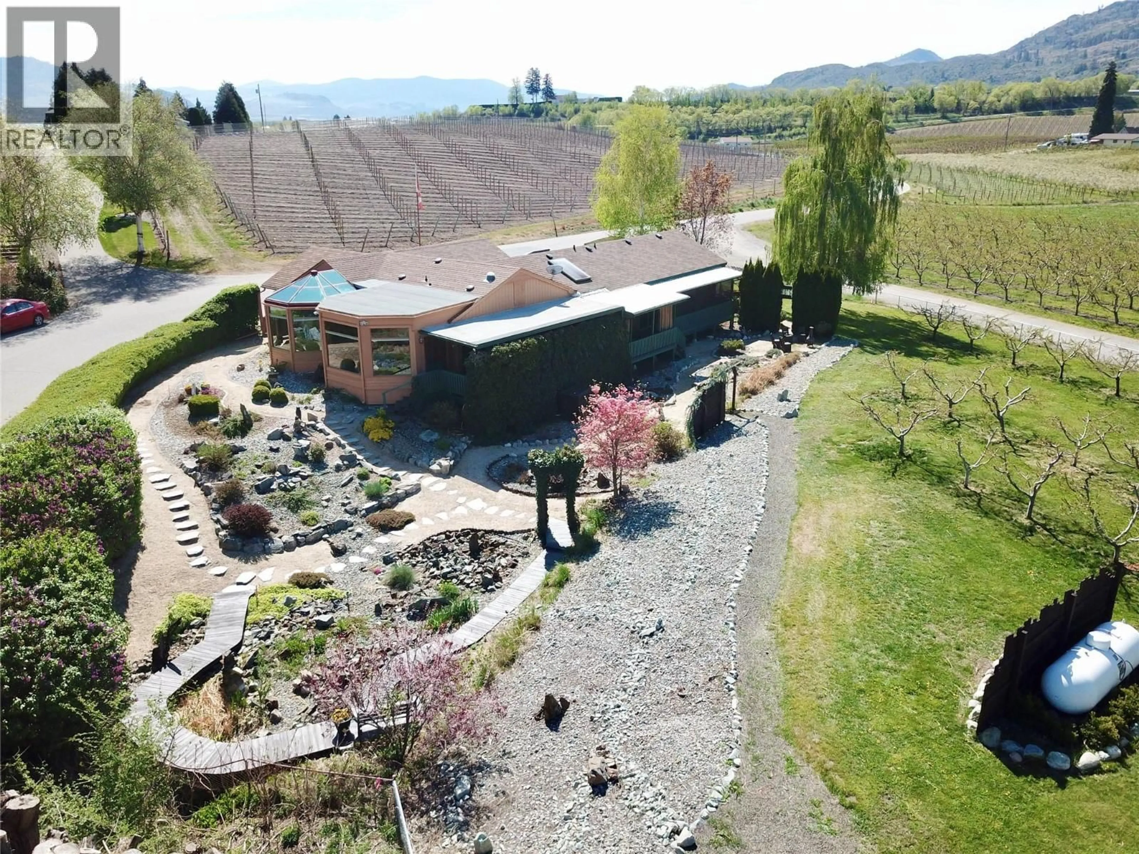 A pic from outside/outdoor area/front of a property/back of a property/a pic from drone, mountain view for 89TH STREET, Osoyoos British Columbia V0H1V2