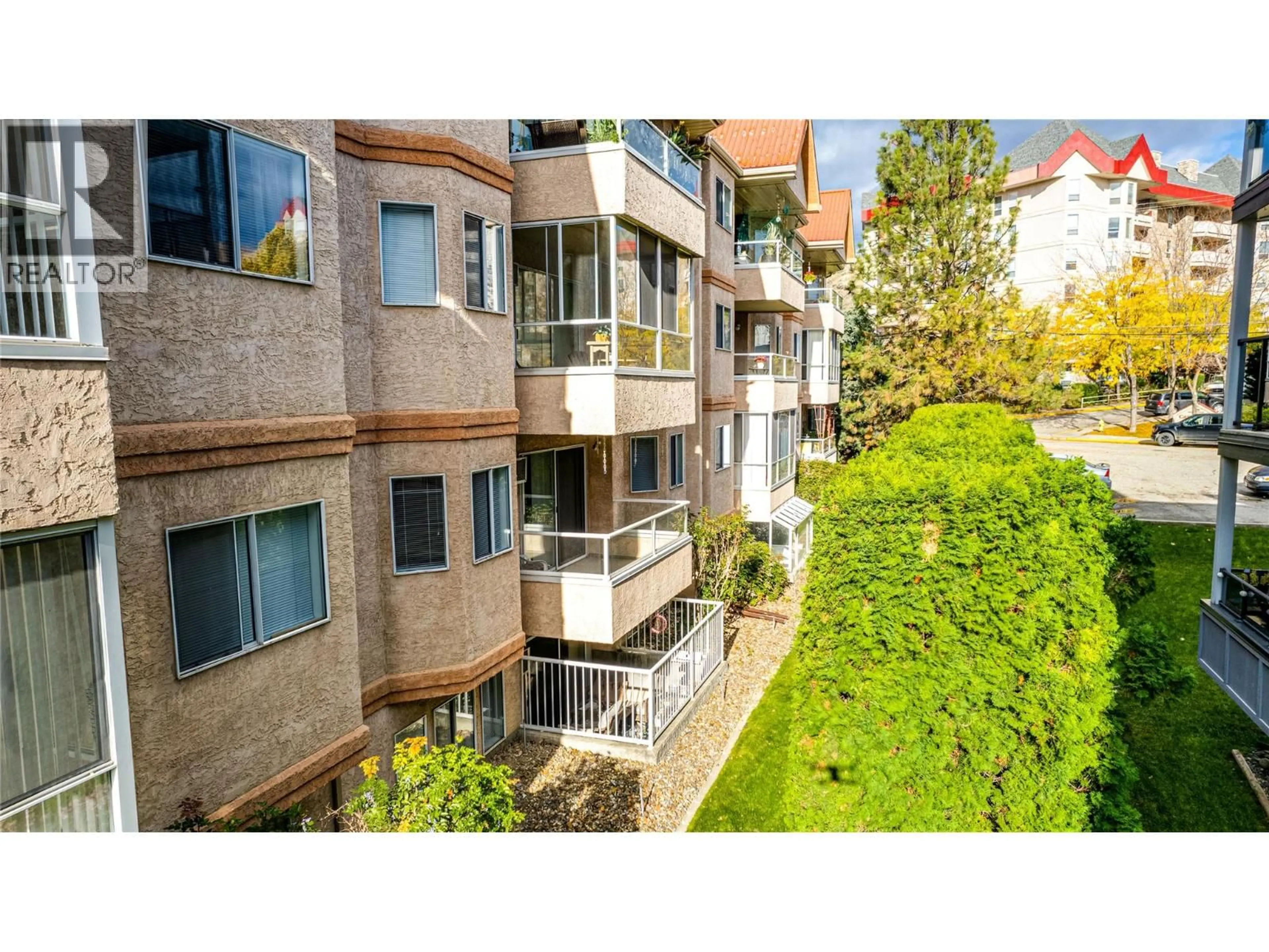 Balcony in the apartment, city buildings view from balcony for 208 - 3609 30 AVENUE, Vernon British Columbia V1T2E6
