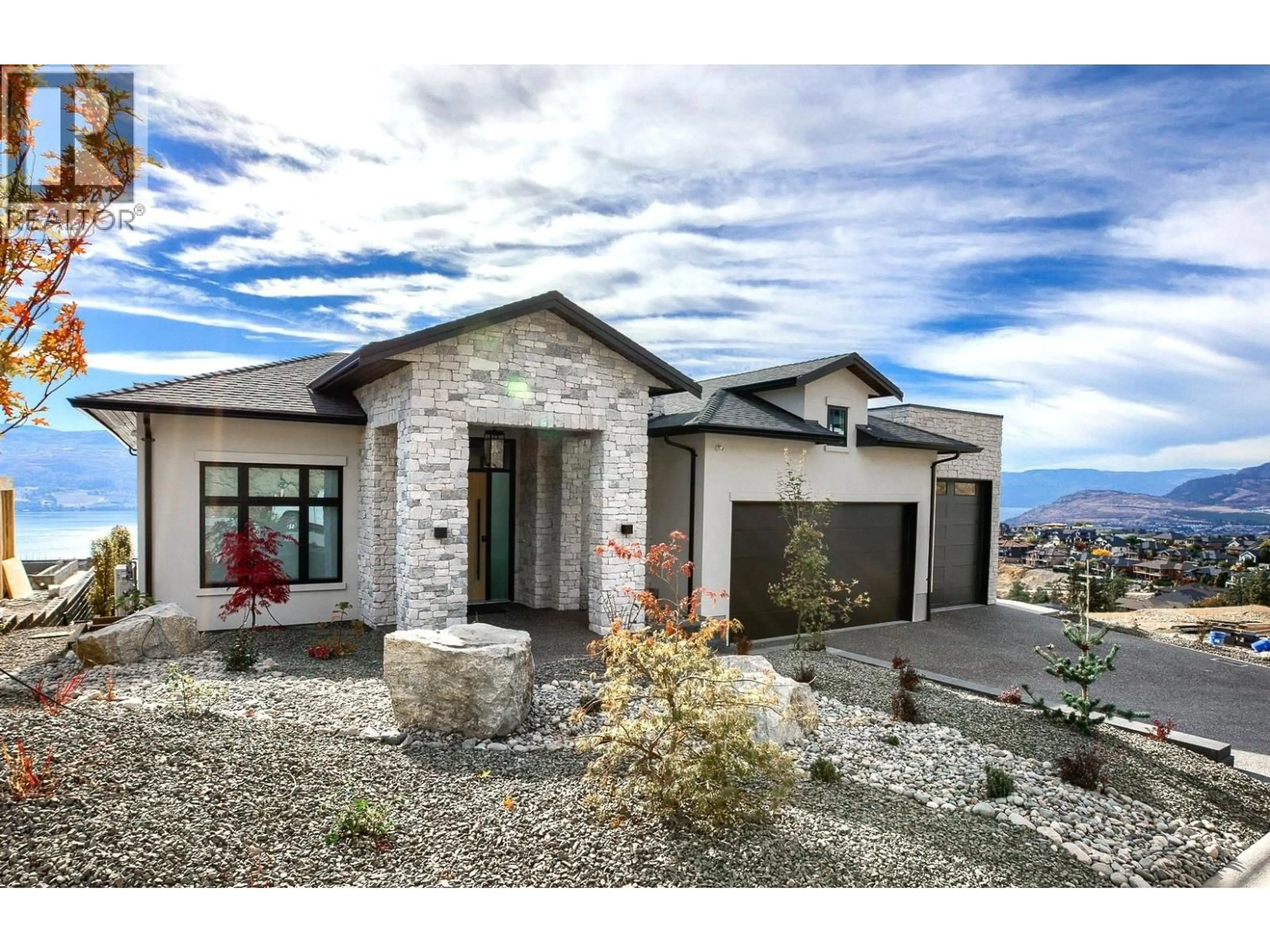 Home with brick exterior material, mountain view for 1403 VINEYARD DRIVE, West Kelowna British Columbia V4T3H9