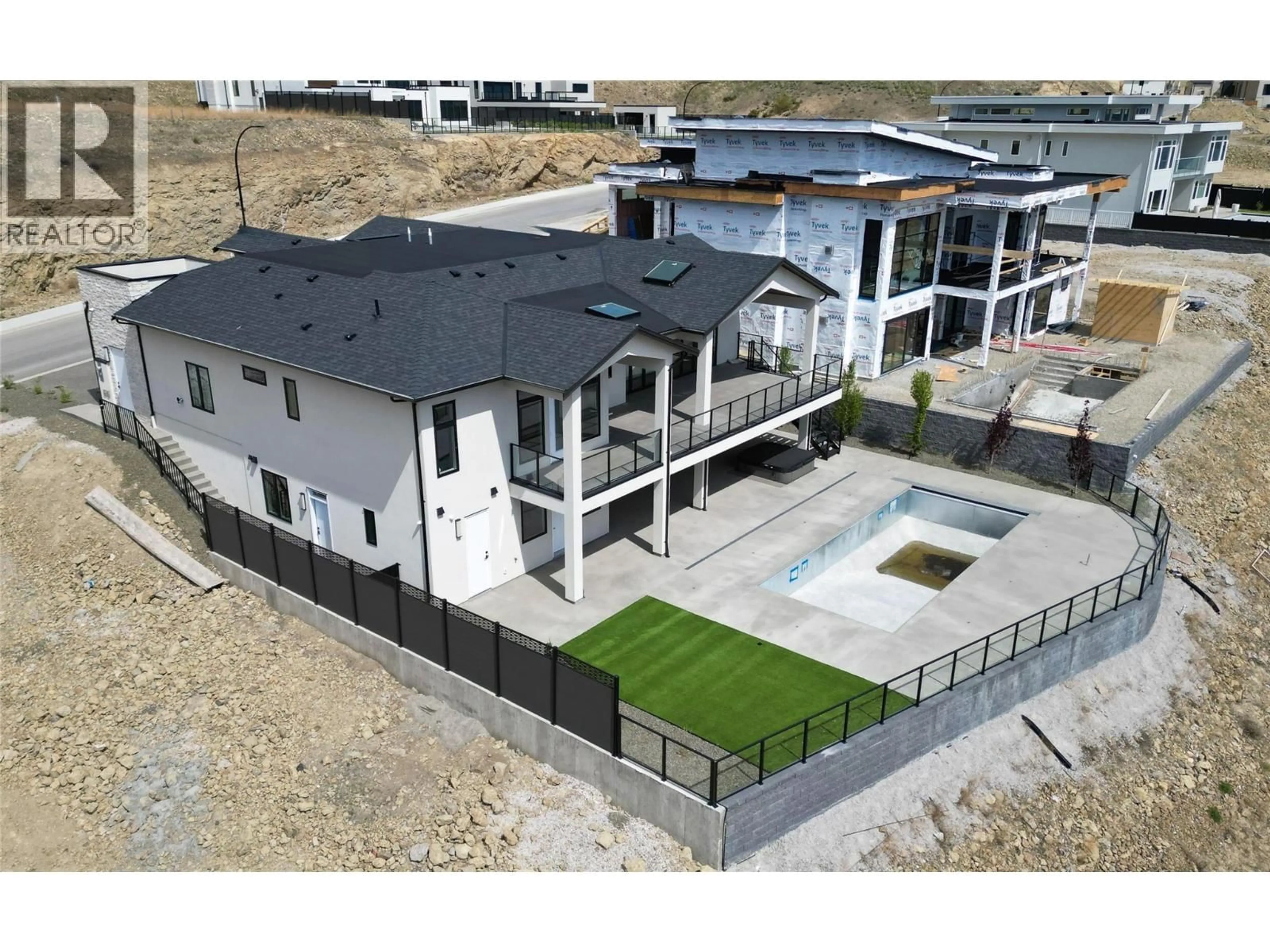 A pic from outside/outdoor area/front of a property/back of a property/a pic from drone, mountain view for 1403 VINEYARD DRIVE, West Kelowna British Columbia V4T3H9