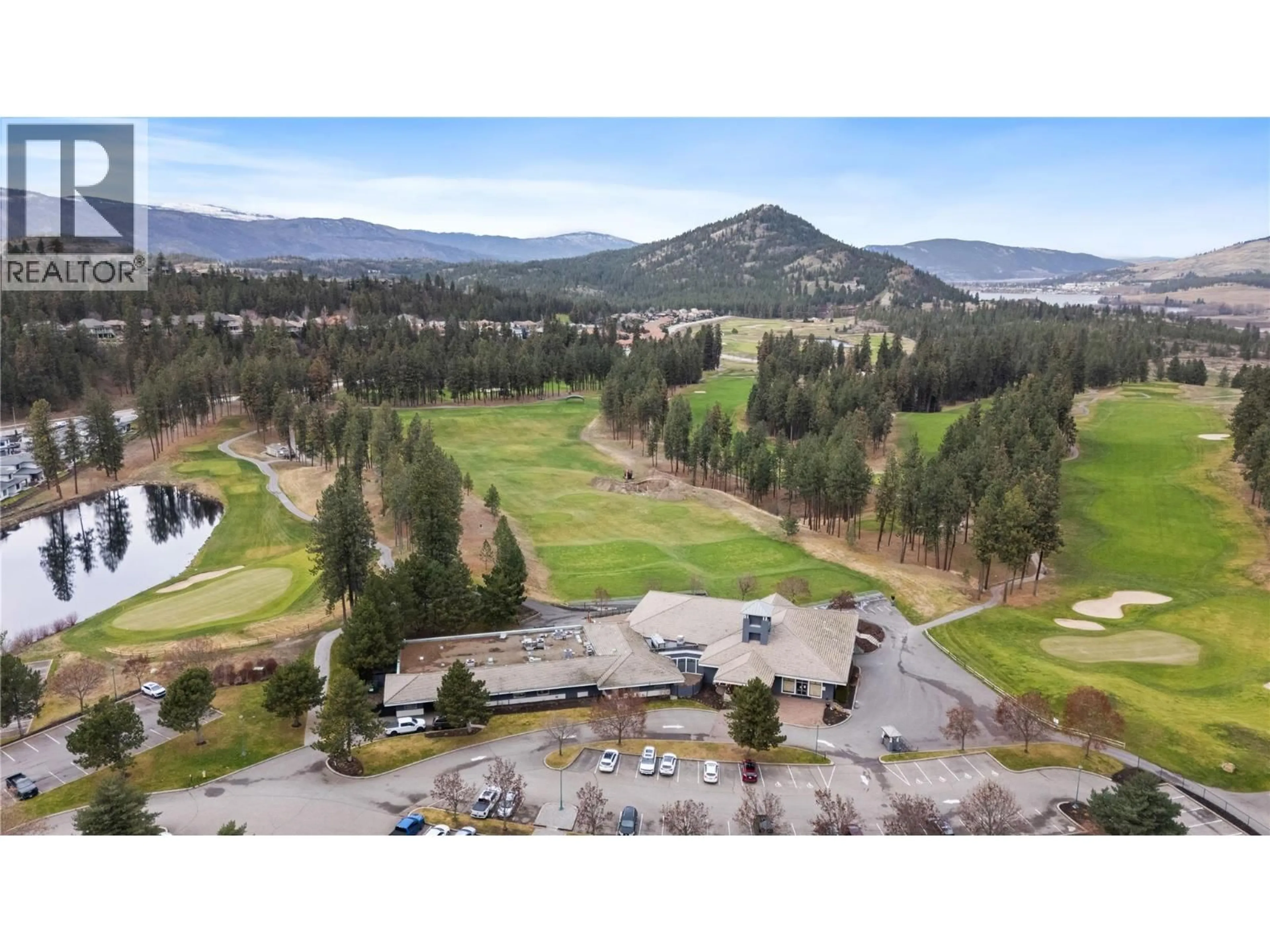 A pic from outside/outdoor area/front of a property/back of a property/a pic from drone, mountain view for 1405 - 1875 COUNTRY CLUB DRIVE, Kelowna British Columbia V1V2W7
