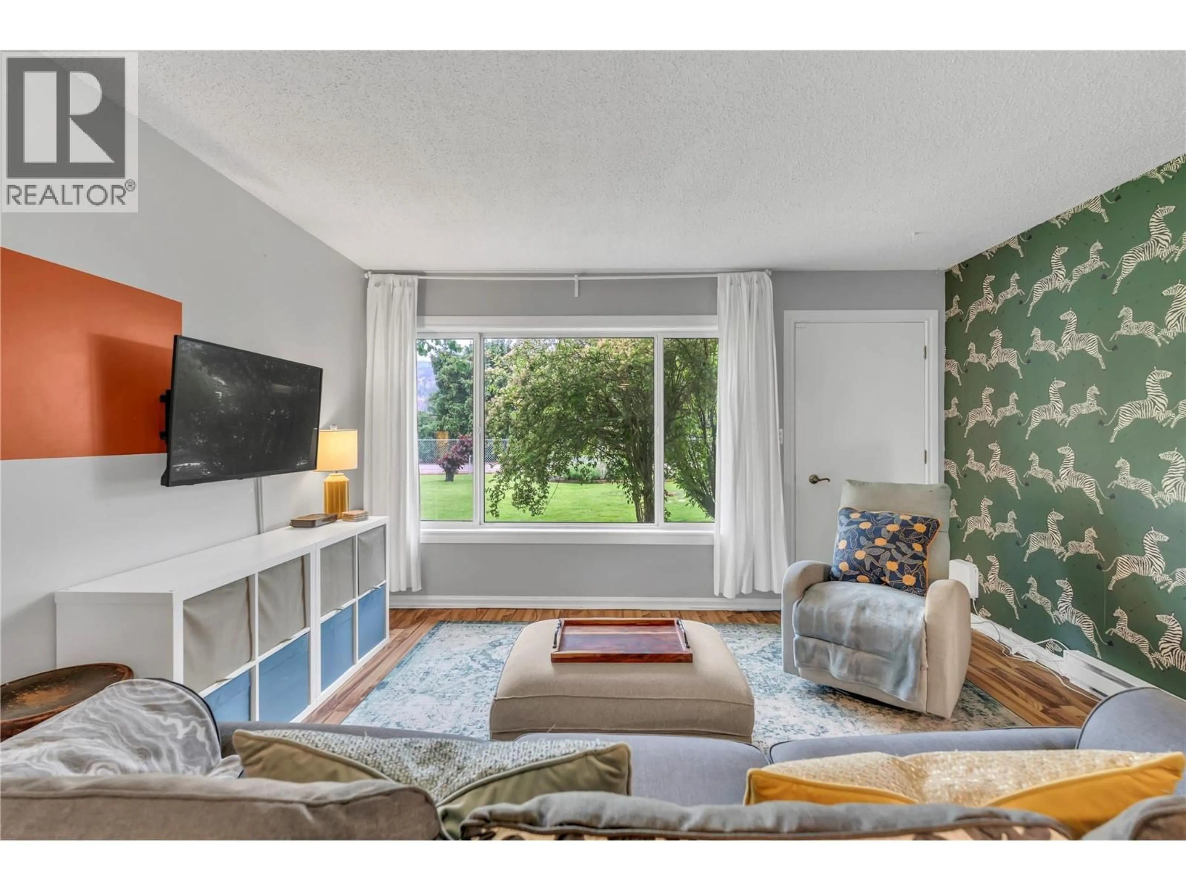 Living room with furniture, unknown for 7513 CREST-A-WAY ROAD, Oliver British Columbia V0H1T0