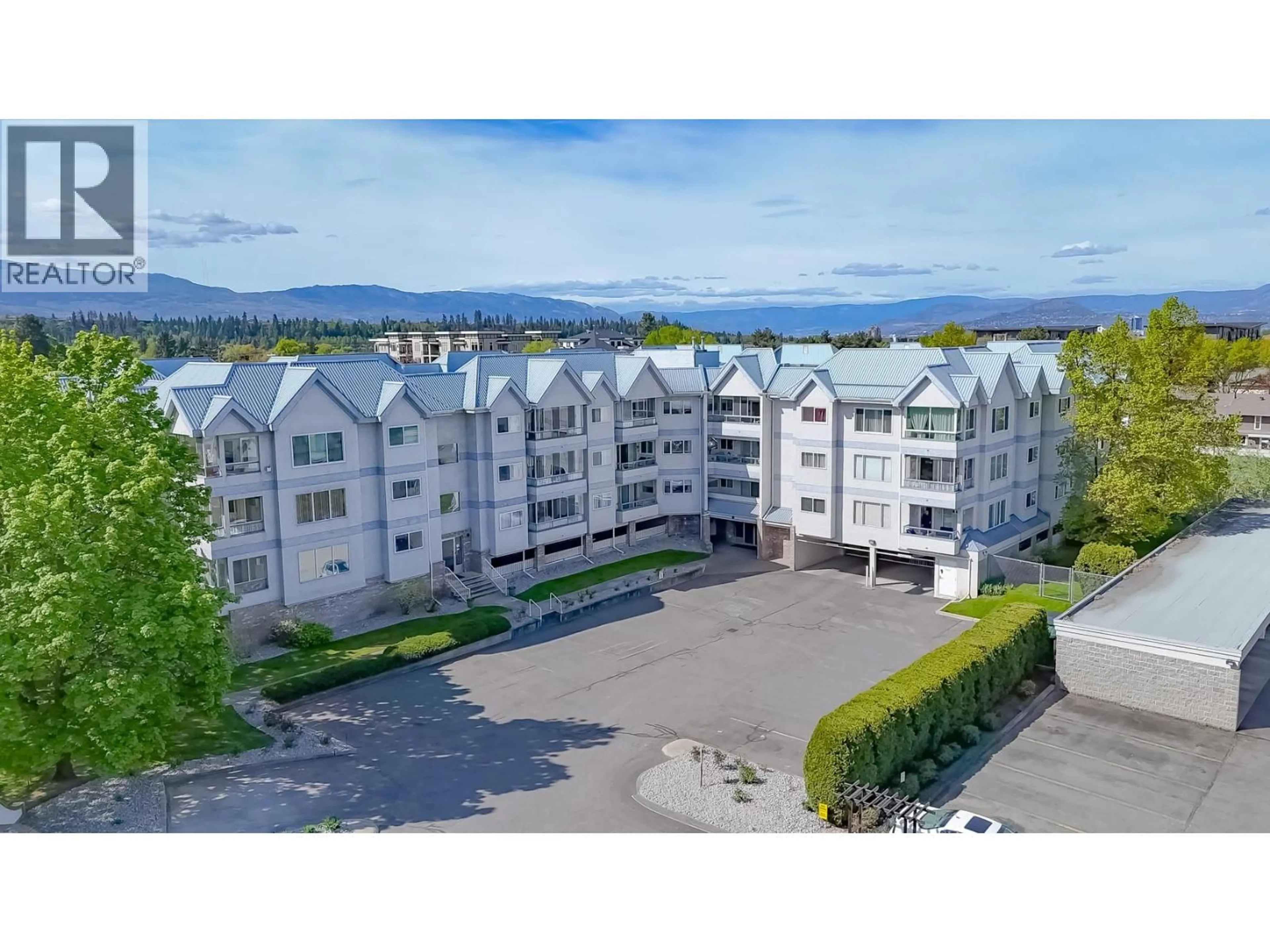 A pic from outside/outdoor area/front of a property/back of a property/a pic from drone, mountain view for 212 - 180 HOLLYWOOD ROAD, Kelowna British Columbia V4T2T7