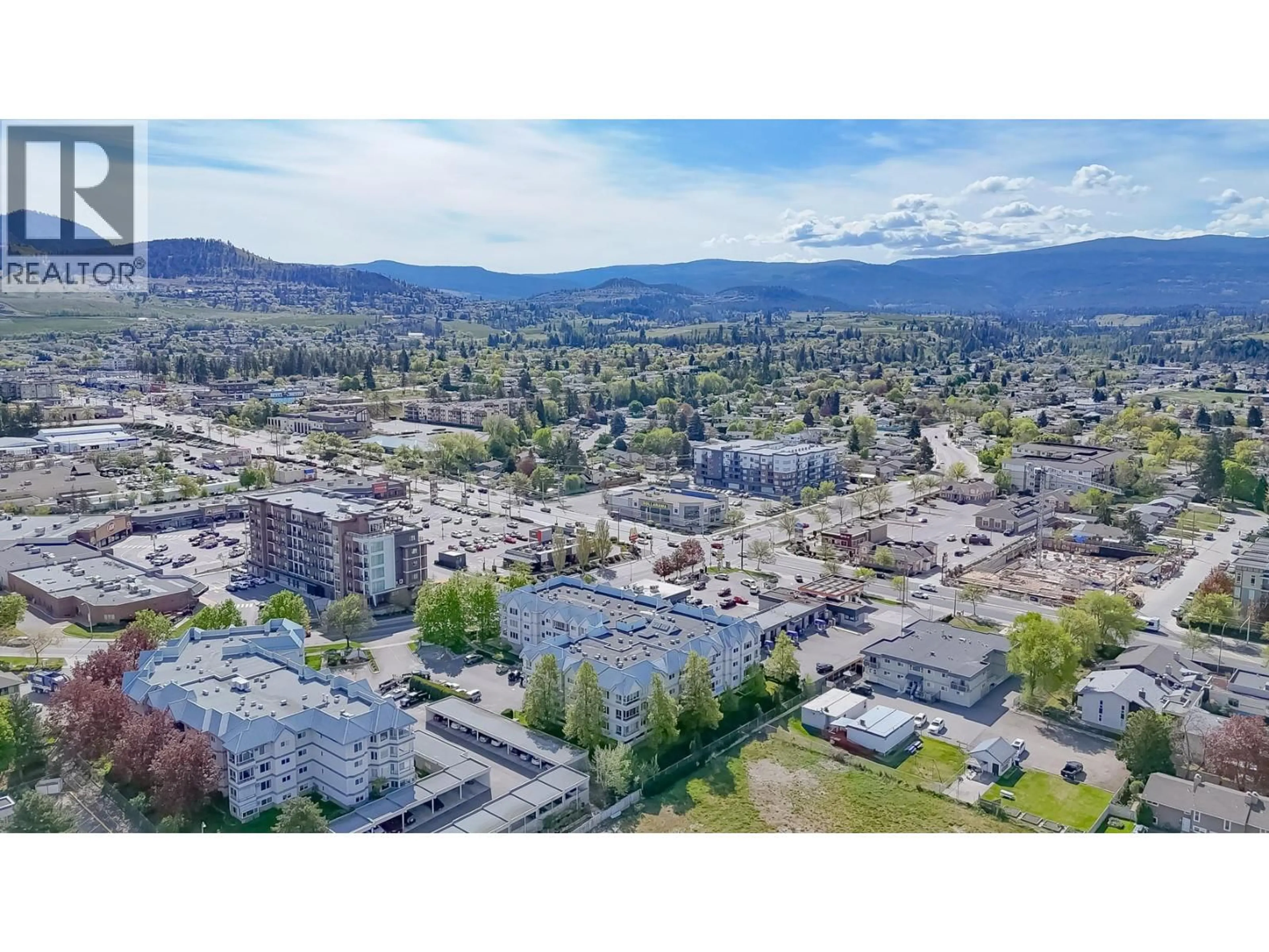 A pic from outside/outdoor area/front of a property/back of a property/a pic from drone, mountain view for 212 - 180 HOLLYWOOD ROAD, Kelowna British Columbia V4T2T7