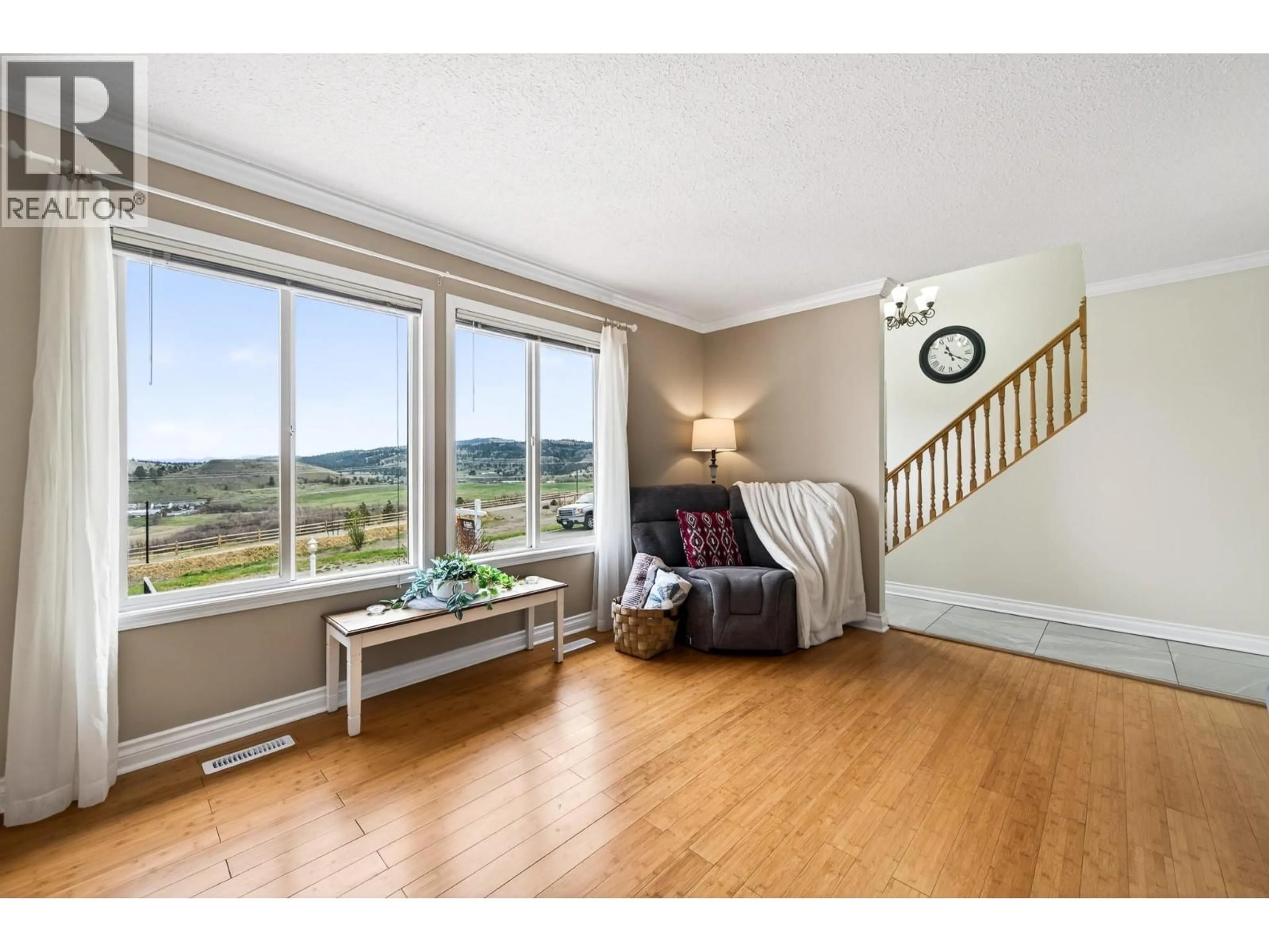 Living room with furniture, wood/laminate floor for 2185 SIFTON LANE, Kamloops British Columbia V1S1A4