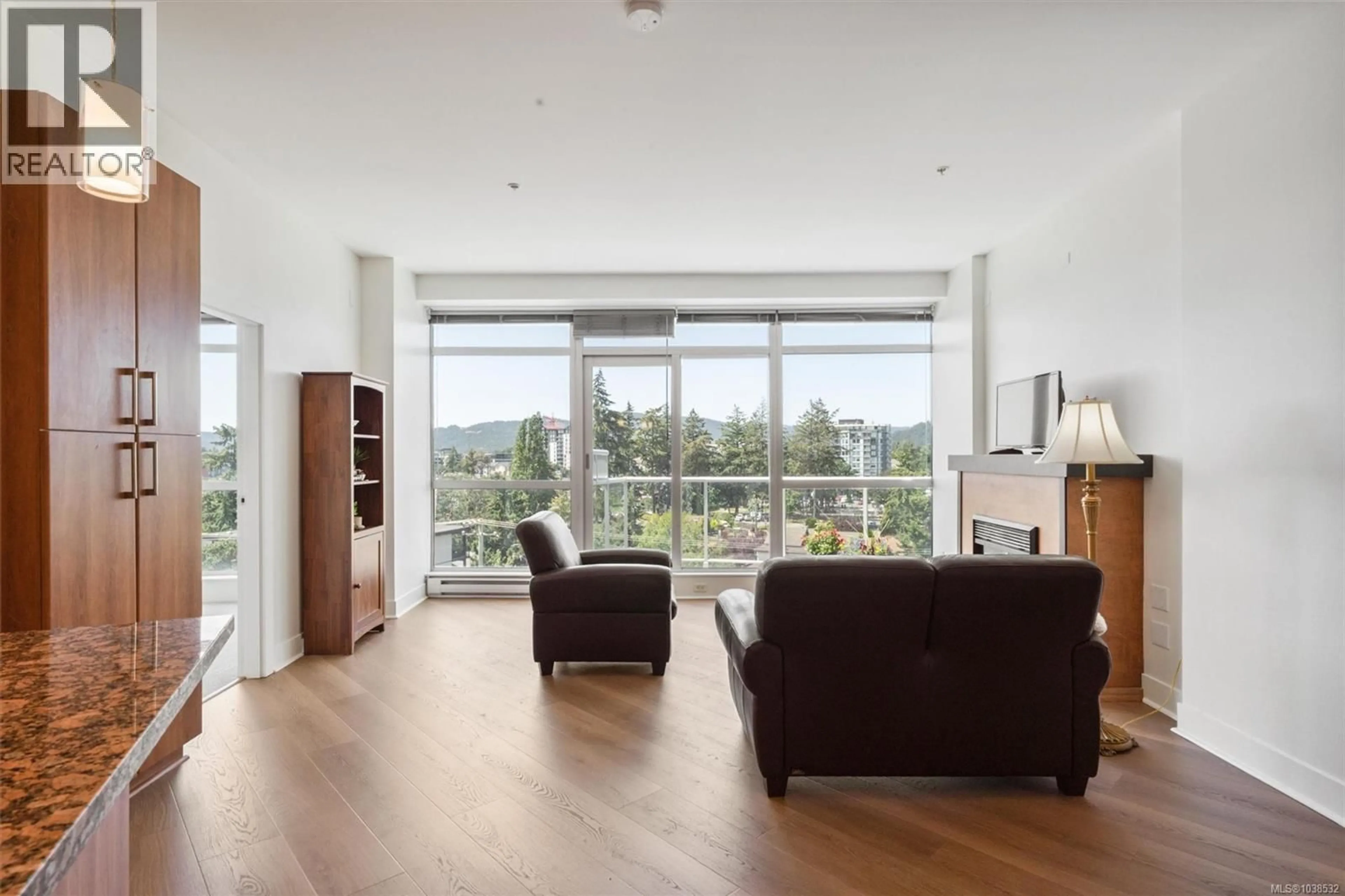 Living room with furniture, wood/laminate floor for 726 - 2745 VETERANS MEMORIAL PARKWAY, Langford British Columbia V9B0H4