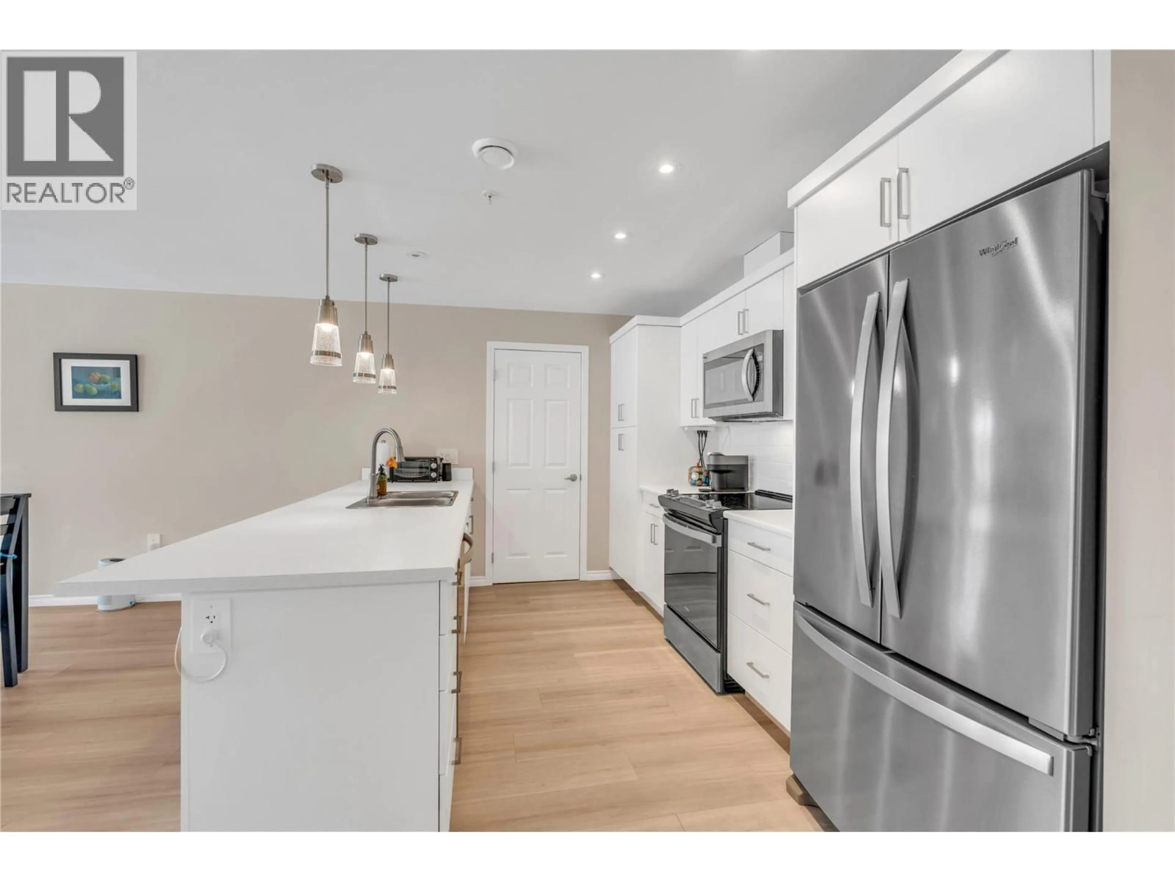 Open concept kitchen, unknown for 306 - 3362 SKAHA LAKE ROAD, Penticton British Columbia V2A0J2