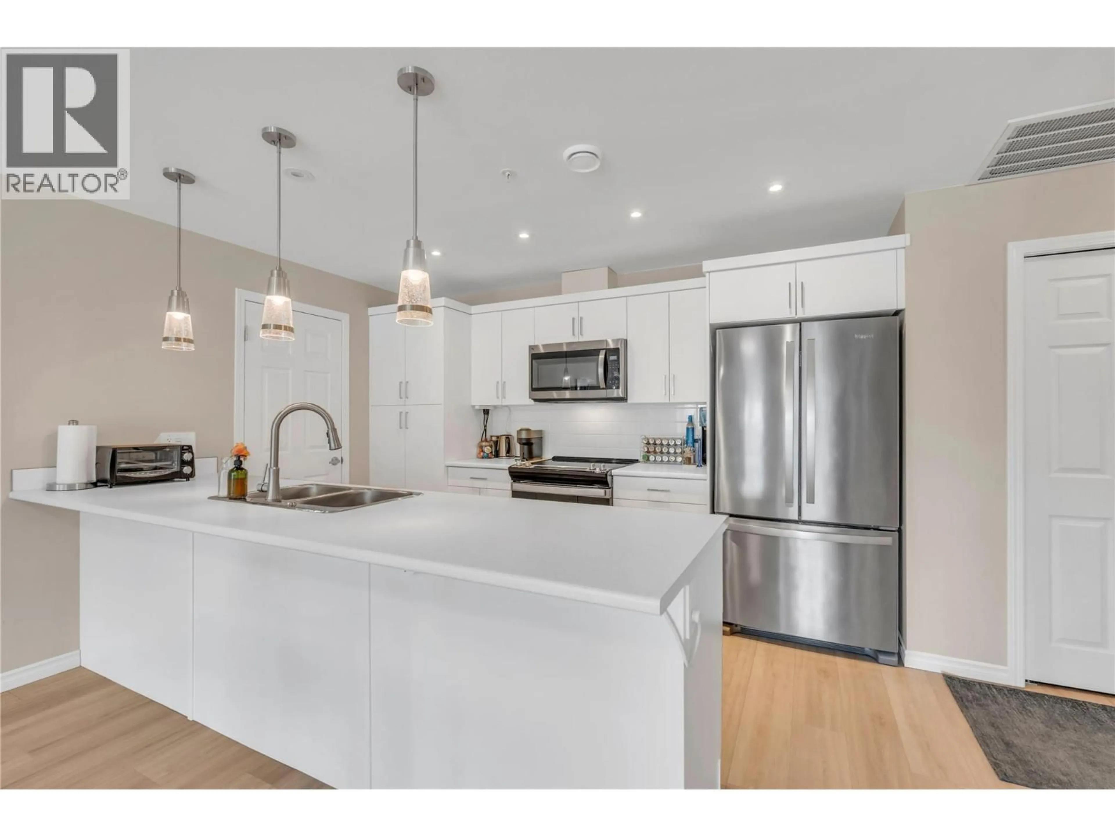 Open concept kitchen, unknown for 306 - 3362 SKAHA LAKE ROAD, Penticton British Columbia V2A0J2