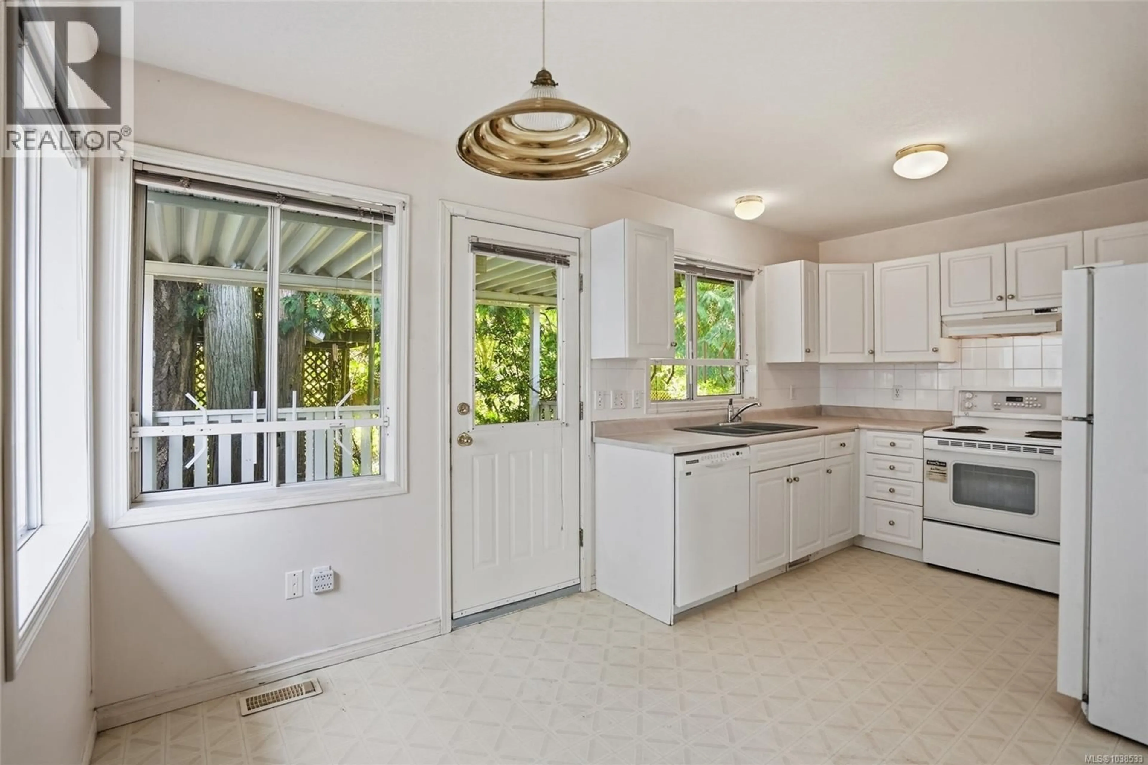 Open concept kitchen, ceramic/tile floor for 5684 CARRINGTON ROAD, Nanaimo British Columbia V9T6C2