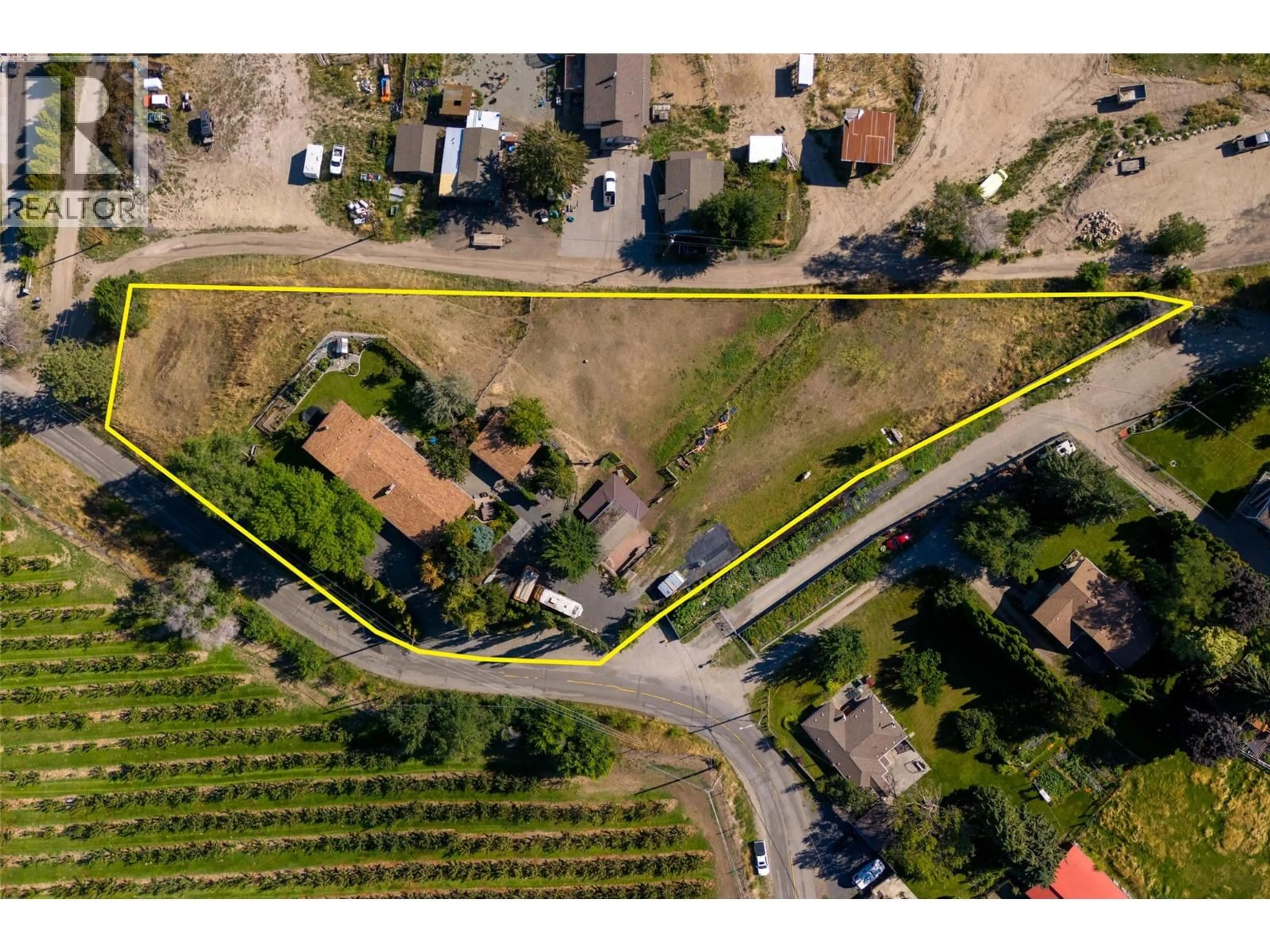 A pic from outside/outdoor area/front of a property/back of a property/a pic from drone, street for 2351 GALLAGHER ROAD, Kelowna British Columbia V1P1G9